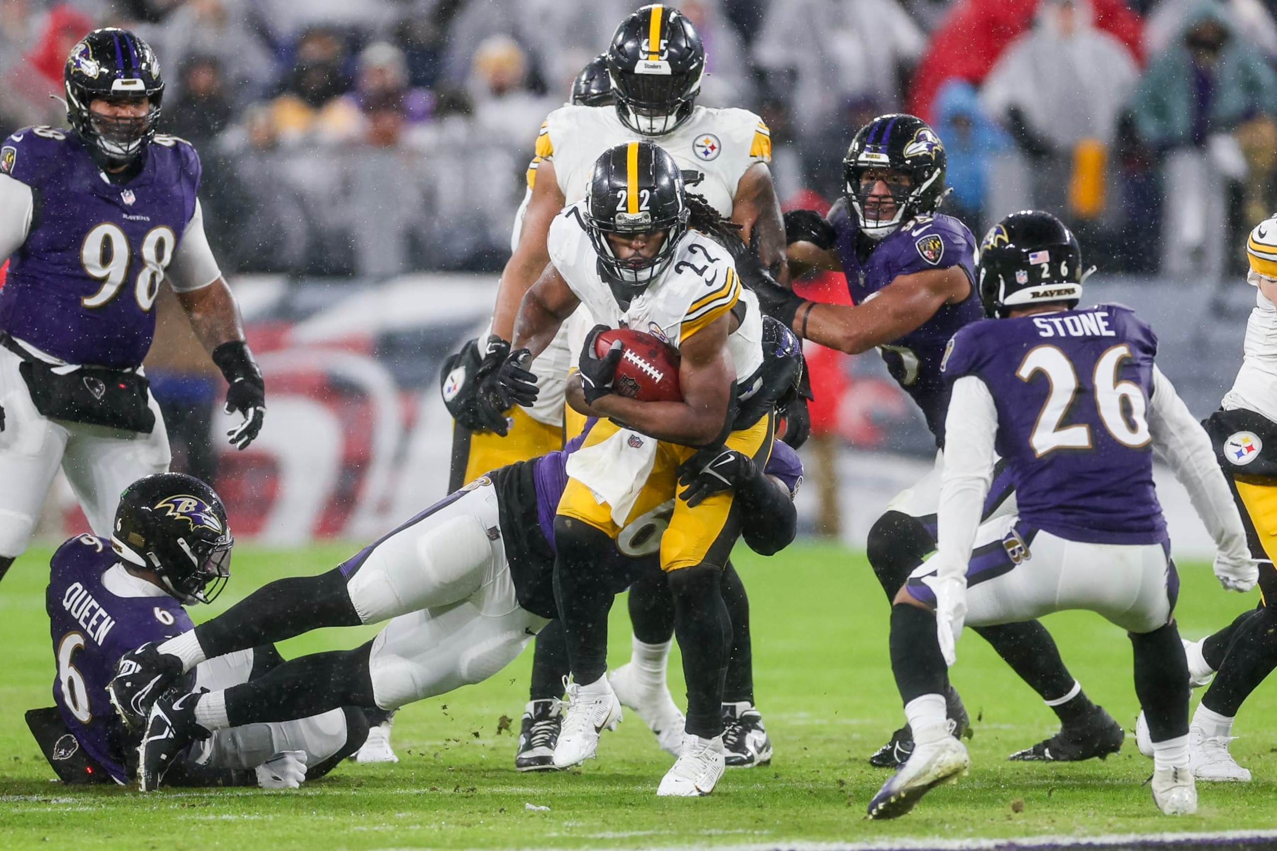 BALTIMORE, MARYLAND - JANUARY 06: Najee Harris #22 of the Pittsburgh Steelers runs the ball up the field in the first quarter of a game against the Baltimore Ravens at M&T Bank Stadium on January 06, 2024 in Baltimore, Maryland. (Photo by Rob Carr/Getty Images)
