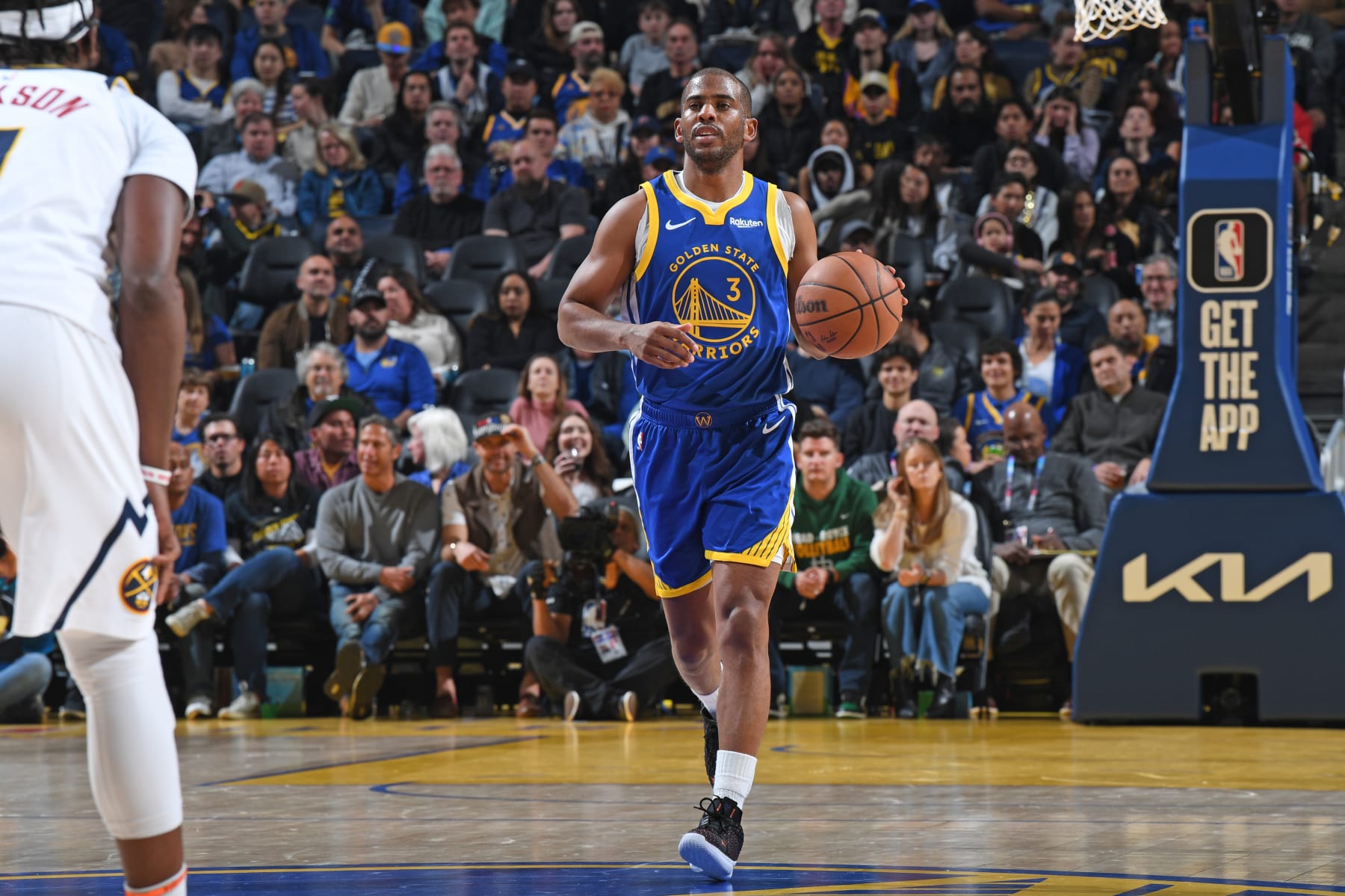 SAN FRANCISCO, CA - JANUARY 4: Chris Paul #3 of the Golden State Warriors dribbles the ball during the game against the Denver Nuggets on January 4, 2024 at Chase Center in San Francisco, California. NOTE TO USER: User expressly acknowledges and agrees that, by downloading and or using this photograph, user is consenting to the terms and conditions of Getty Images License Agreement. Mandatory Copyright Notice: Copyright 2024 NBAE (Photo by Noah Graham/NBAE via Getty Images)