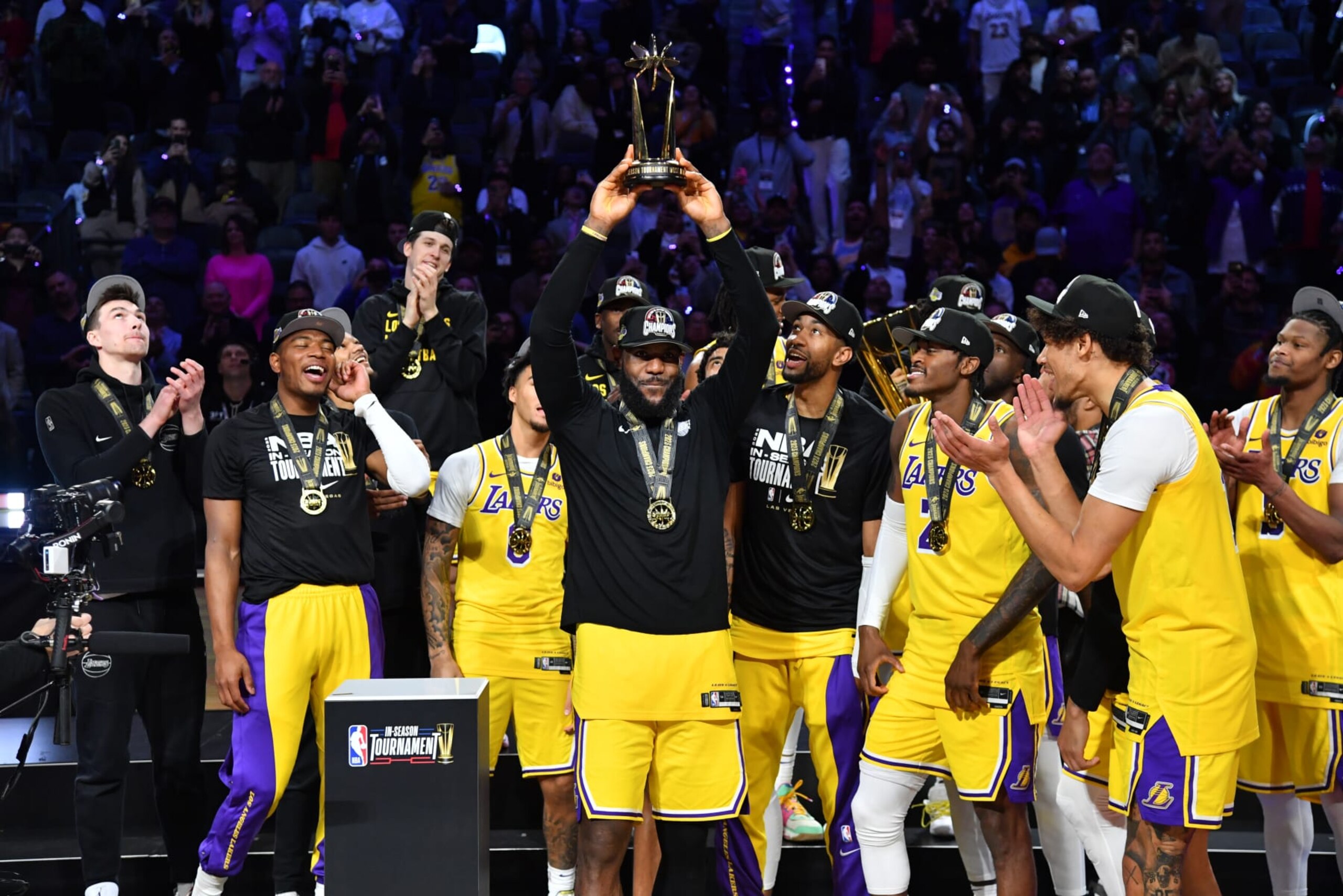 LAS VEGAS, NV - DECEMBER 9: LeBron James #23 of the Los Angeles Lakers celebrates with the In-Season Tournament MVP trophy after winning the In-Season Tournament Championship game against the Indiana Pacers on December 9, 2023 at T-Mobile Arena in Las Vegas, Nevada. NOTE TO USER: User expressly acknowledges and agrees that, by downloading and or using this photograph, User is consenting to the terms and conditions of the Getty Images License Agreement. Mandatory Copyright Notice: Copyright 2023 NBAE (Photo by Juan Ocampo/NBAE via Getty Images)
