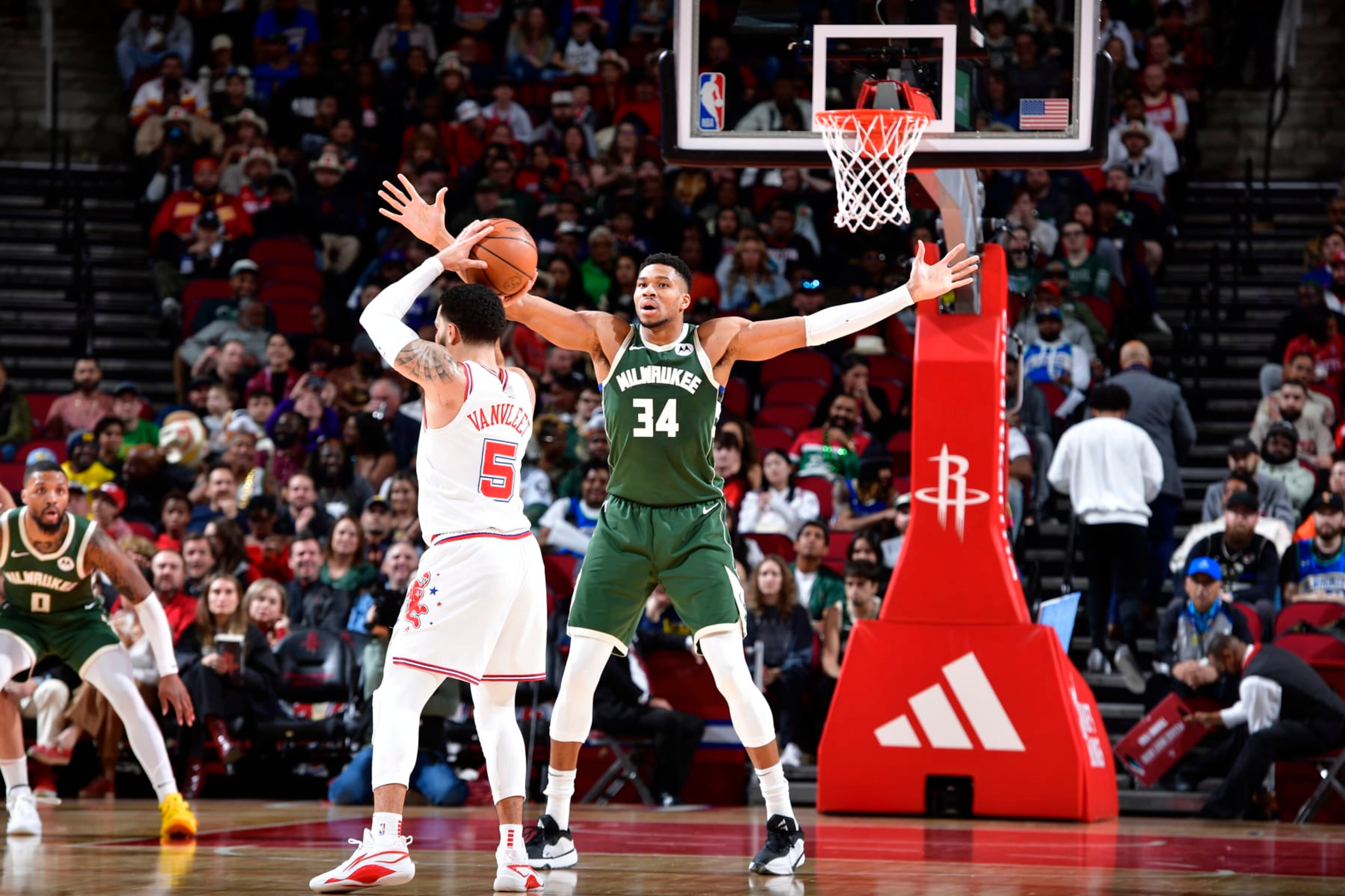 HOUSTON, TX - JANUARY 6: Fred VanVleet #5 of the Houston Rockets looks to pass the ball while Giannis Antetokounmpo #34 of the Milwaukee Bucks plays defense during the game on January 6, 2024 at the Toyota Center in Houston, Texas. NOTE TO USER: User expressly acknowledges and agrees that, by downloading and or using this photograph, User is consenting to the terms and conditions of the Getty Images License Agreement. Mandatory Copyright Notice: Copyright 2024 NBAE (Photo by Logan Riely/NBAE via Getty Images) HOUSTON, TX - JANUARY 6: Fred VanVleet #5 of the Houston Rockets looks to pass the ball while Giannis Antetokounmpo #34 of the Milwaukee Bucks plays defense during the game on January 6, 2024 at the Toyota Center in Houston, Texas. NOTE TO USER: User expressly acknowledges and agrees that, by downloading and or using this photograph, User is consenting to the terms and conditions of the Getty Images License Agreement. Mandatory Copyright Notice: Copyright 2024 NBAE (Photo by Logan Riely/NBAE via Getty Images)