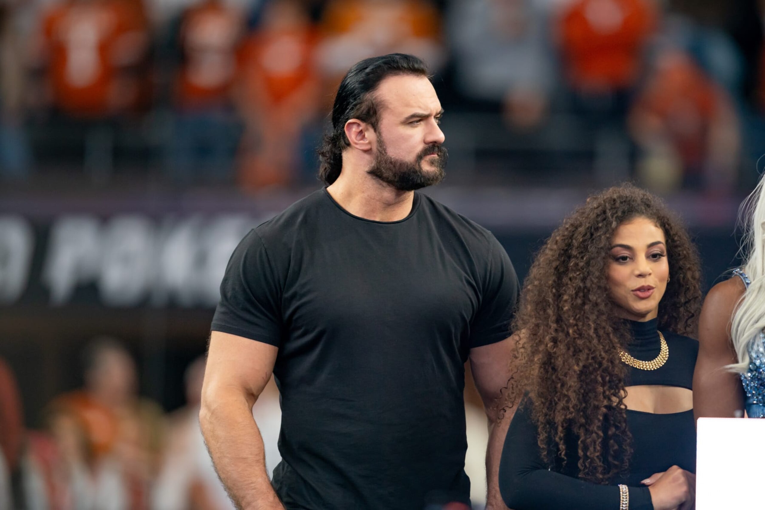 ARLINGTON, TX - DECEMBER 02: WWE superstar Drew McIntyre stands on stage after winning the Big 12 Championship game between the Texas Longhorns and the Oklahoma State Cowboys on December 02, 2023 at AT&T Stadium in Arlington, TX. (Photo by Chris Leduc/Icon Sportswire via Getty Images) ARLINGTON, TX - DECEMBER 02: WWE superstar Drew McIntyre stands on stage after winning the Big 12 Championship game between the Texas Longhorns and the Oklahoma State Cowboys on December 02, 2023 at AT&T Stadium in Arlington, TX. (Photo by Chris Leduc/Icon Sportswire via Getty Images)