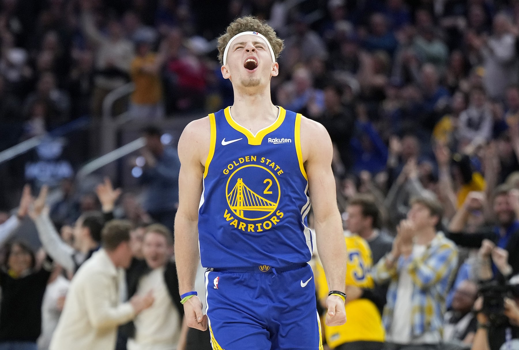 SAN FRANCISCO, CALIFORNIA - JANUARY 04: Brandin Podziemski #2 of the Golden State Warriors reacts after making a three-point shot against the Denver Nuggets during the third quarter at Chase Center on January 04, 2024 in San Francisco, California. NOTE TO USER: User expressly acknowledges and agrees that, by downloading and or using this photograph, User is consenting to the terms and conditions of the Getty Images License Agreement. (Photo by Thearon W. Henderson/Getty Images)