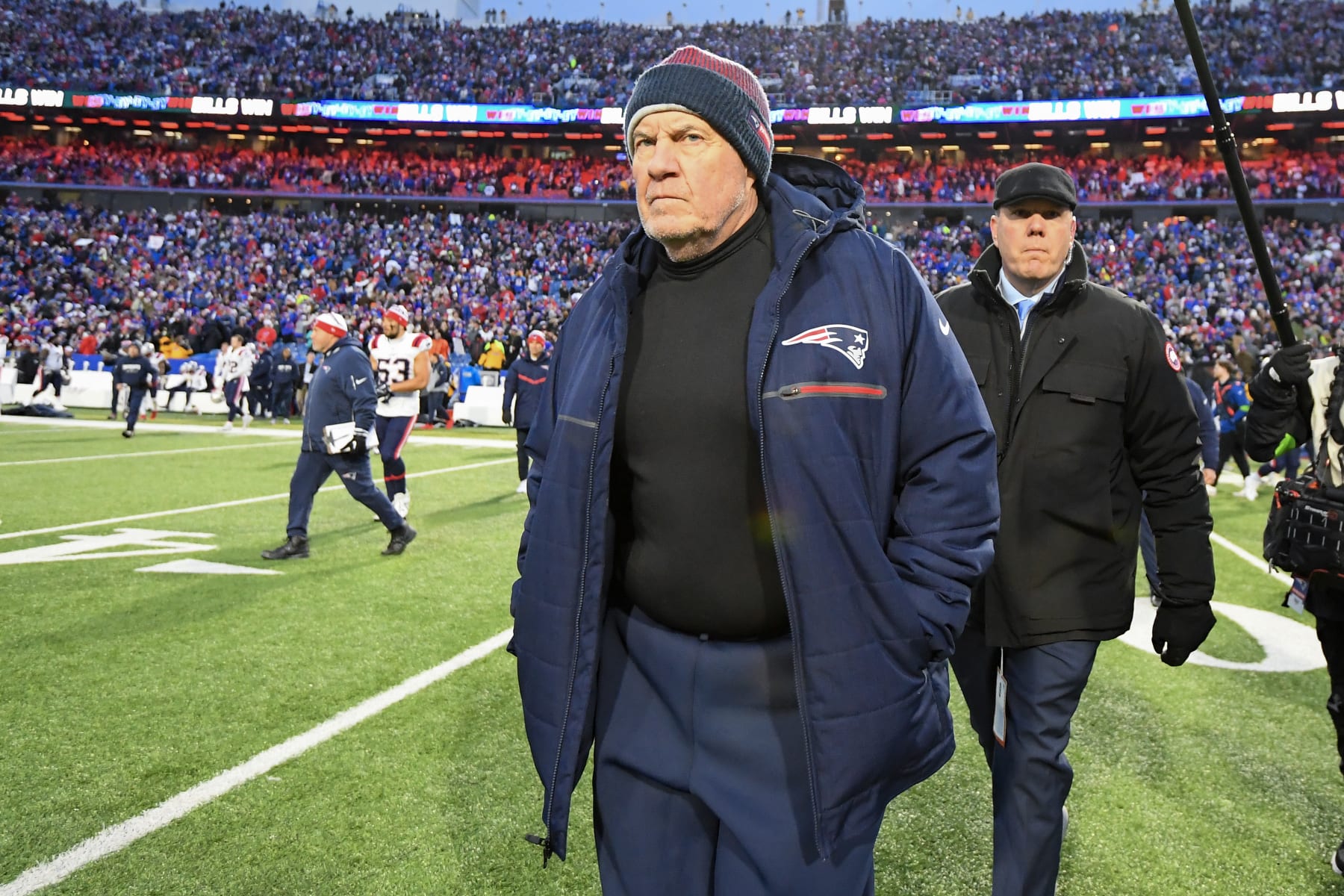 ORCHARD PARK, NEW YORK - DECEMBER 31: Head coach Bill Belichick of the New England Patriots walks off the field after a game against the Buffalo Bills at Highmark Stadium on December 31, 2023 in Orchard Park, New York. (Photo by Rich Barnes/Getty Images)