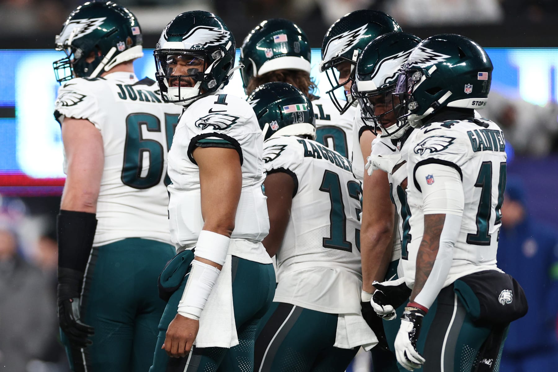 EAST RUTHERFORD, NEW JERSEY - JANUARY 07: Jalen Hurts #1 of the Philadelphia Eagles looks on during the first half in the game against the New York Giants at MetLife Stadium on January 07, 2024 in East Rutherford, New Jersey. (Photo by Elsa/Getty Images)