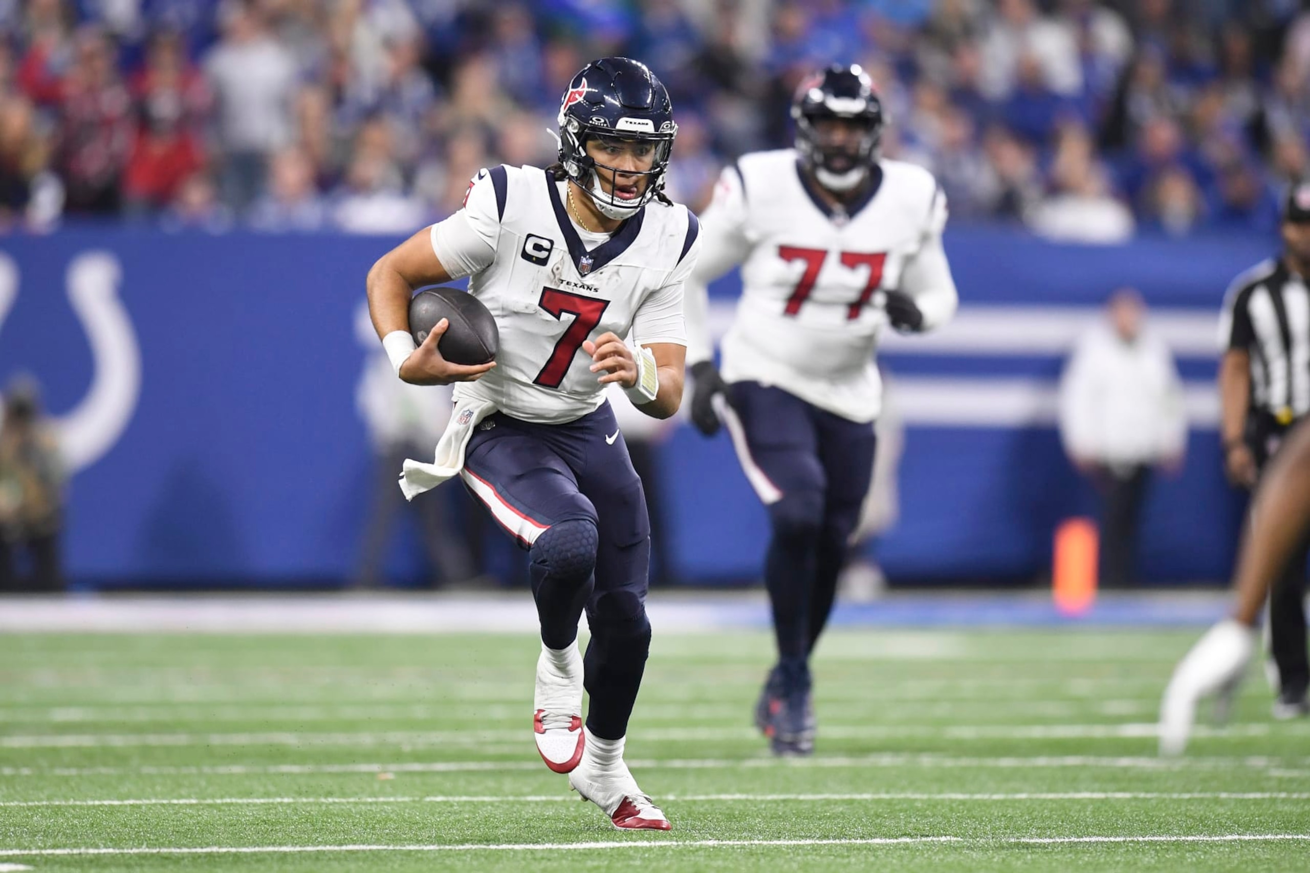 INDIANAPOLIS, IN - JANUARY 06: Houston Texans Quarterback C.J. Stroud (7) scrambles during the NFL game between the Houston Texans and the Indianapolis Colts on January 6, 2024, at Lucas Oil Stadium in Indianapolis, Indiana. (Photo by Michael Allio/Icon Sportswire via Getty Images)
