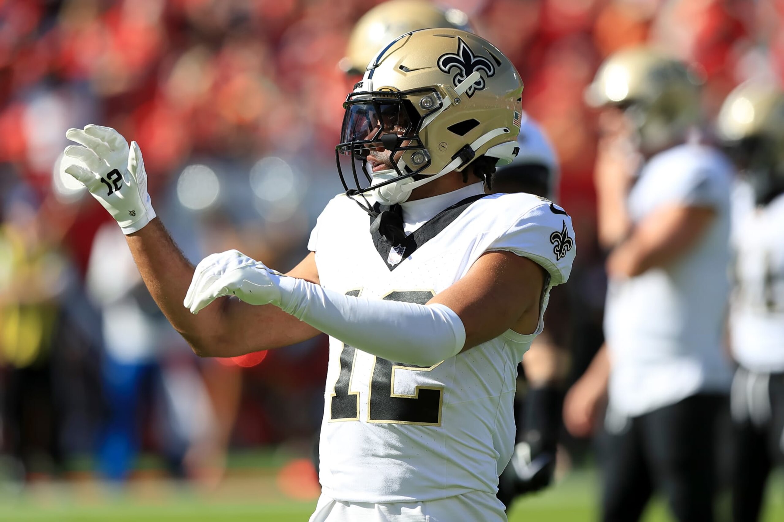 TAMPA, FL - DECEMBER 31: New Orleans Saints Wide Receiver Chris Olave (12) signals a first down during the regular season game between the New Orleans Saints and the Tampa Bay Buccaneers on December 31, 2023 at Raymond James Stadium in Tampa, Florida. (Photo by Cliff Welch/Icon Sportswire via Getty Images)