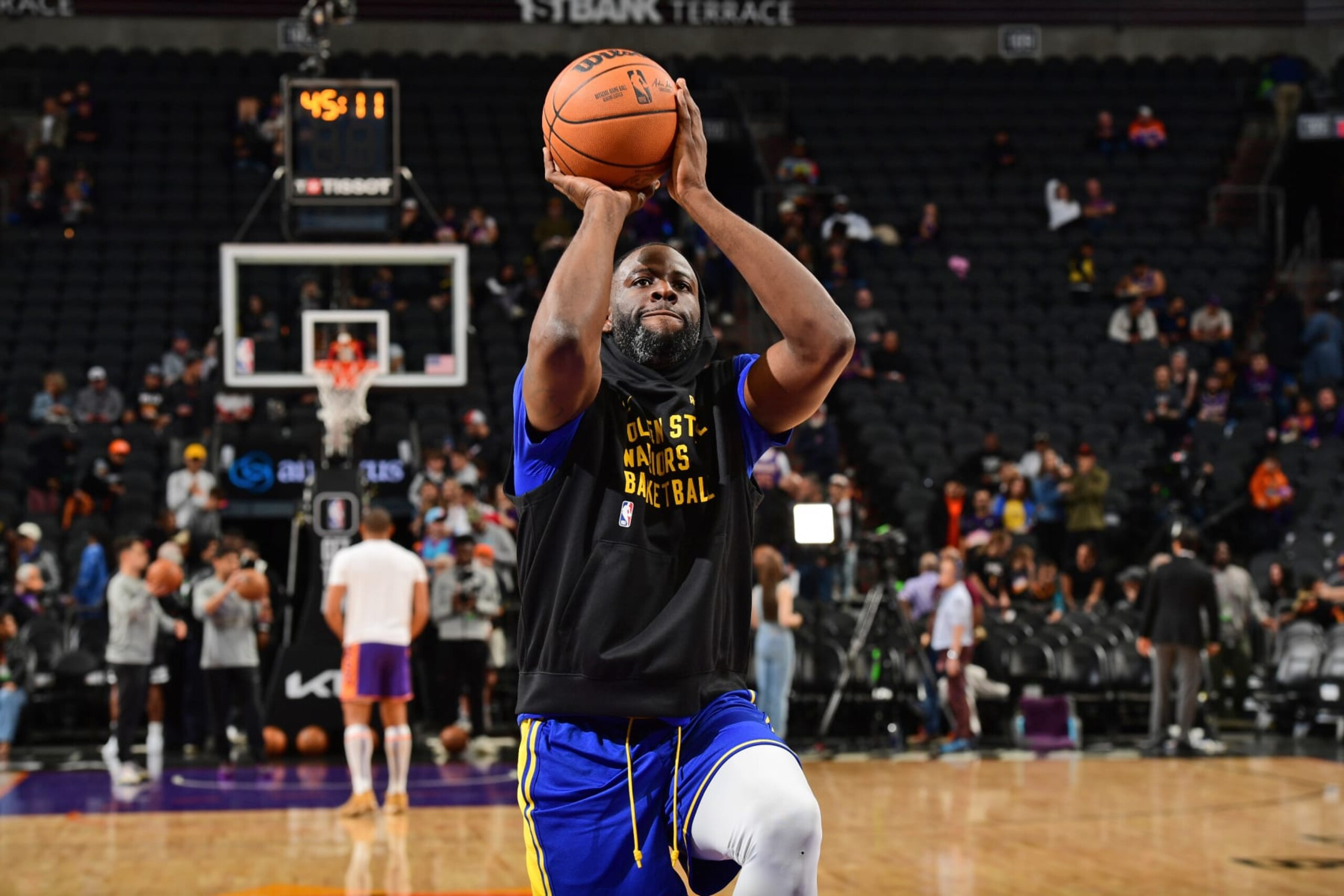 PHOENIX, AZ - DECEMBER 12: Draymond Green #23 of the Golden State Warriors warms up before the game against the Phoenix Suns on December 12, 2023 at Footprint Center in Phoenix, Arizona. NOTE TO USER: User expressly acknowledges and agrees that, by downloading and or using this photograph, user is consenting to the terms and conditions of the Getty Images License Agreement. Mandatory Copyright Notice: Copyright 2023 NBAE (Photo by Kate Frese/NBAE via Getty Images)