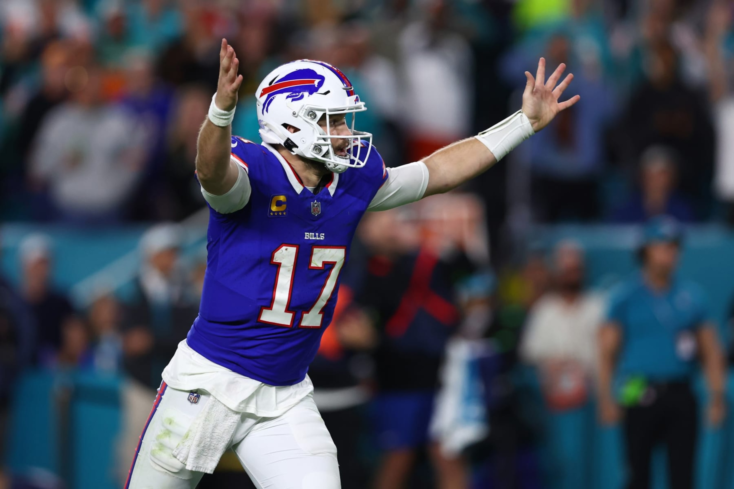 MIAMI GARDENS, FLORIDA - JANUARY 07: Josh Allen #17 of the Buffalo Bills reacts after a long completion during the second quarter against the Miami Dolphins at Hard Rock Stadium on January 07, 2024 in Miami Gardens, Florida. (Photo by Megan Briggs/Getty Images) MIAMI GARDENS, FLORIDA - JANUARY 07: Josh Allen #17 of the Buffalo Bills reacts after a long completion during the second quarter against the Miami Dolphins at Hard Rock Stadium on January 07, 2024 in Miami Gardens, Florida. (Photo by Megan Briggs/Getty Images)