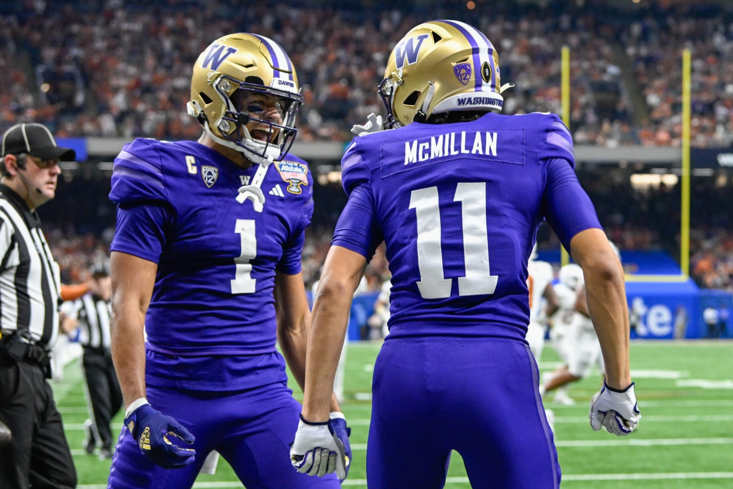 NEW ORLEANS, LA - JANUARY 01: Washington Huskies wide receiver Rome Odunze (1) congratulates Washington Huskies wide receiver Jalen McMillan (11) after his touchdown reception during the Semifinal All State Sugar Bowl football game between the Texas Longhorns and Washington Huskies at the Caesars Superdome on January 1, 2024 in New Orleans Louisiana. (Photo by Ken Murray/Icon Sportswire via Getty Images)