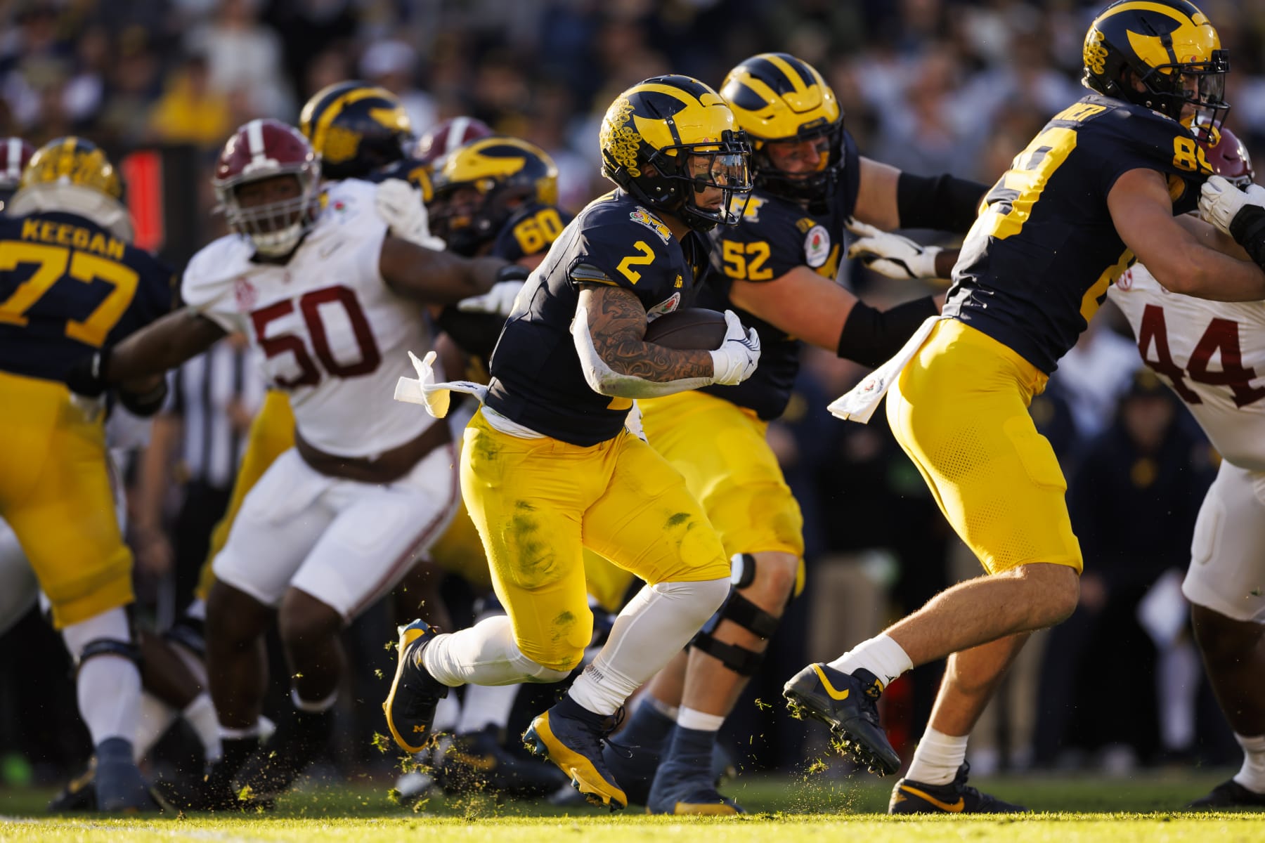 PASADENA, CALIFORNIA - JANUARY 01: Running back Blake Corum #2 of the Michigan Wolverines carries the ball on a run play during the CFP Semifinal Rose Bowl Game against the Alabama Crimson Tide at Rose Bowl Stadium on January 1, 2024 in Pasadena, California. (Photo by Ryan Kang/Getty Images)