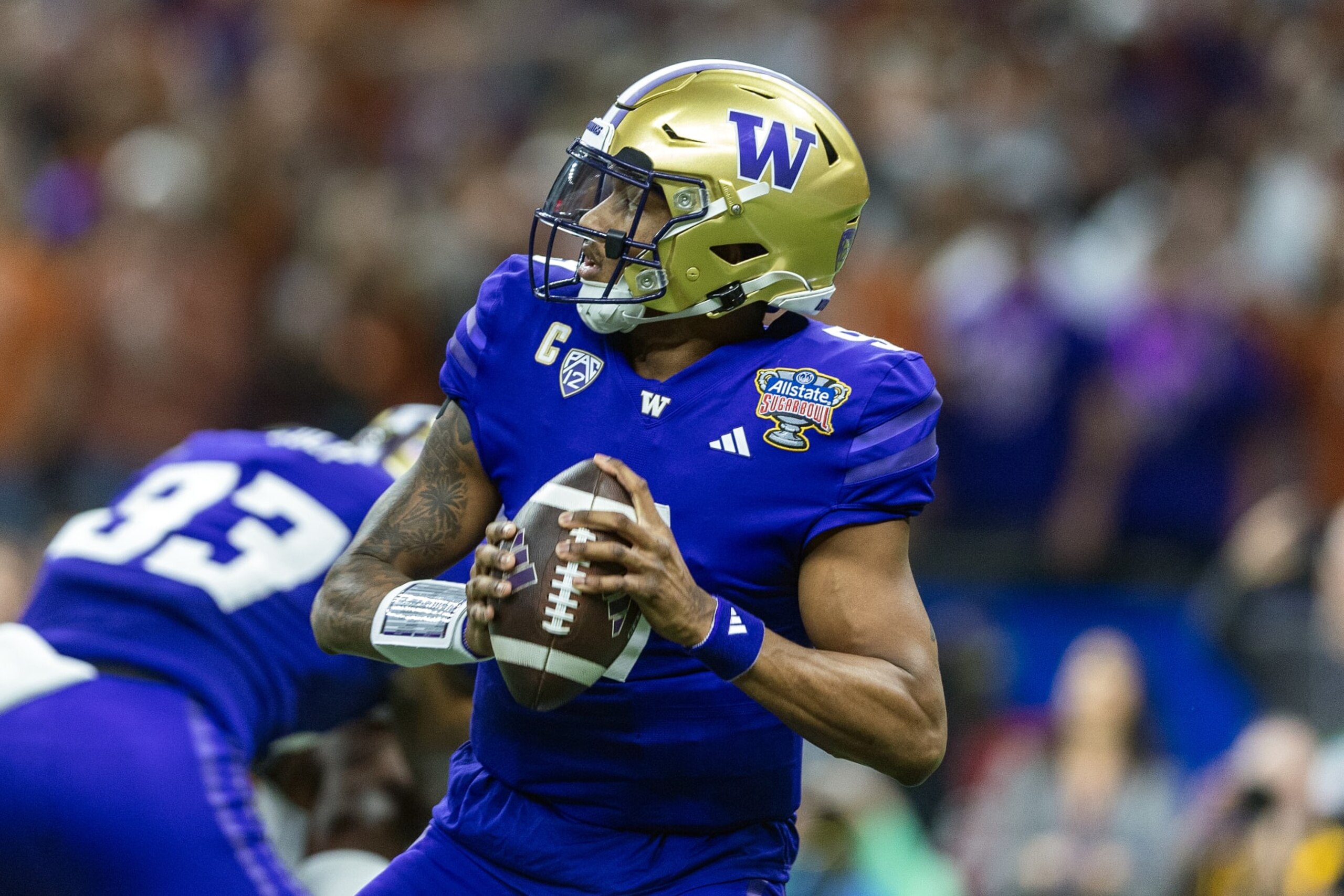 NEW ORLEANS, LA - JANUARY 01: Washington Huskies quarterback Michael Penix Jr. (9) throws a pass during a game between the Texas Longhorns and the Washington Huskies on January 1, 2024, at the Caesars Superdome in New Orleans, LA. (Photo by John Korduner/Icon Sportswire via Getty Images)