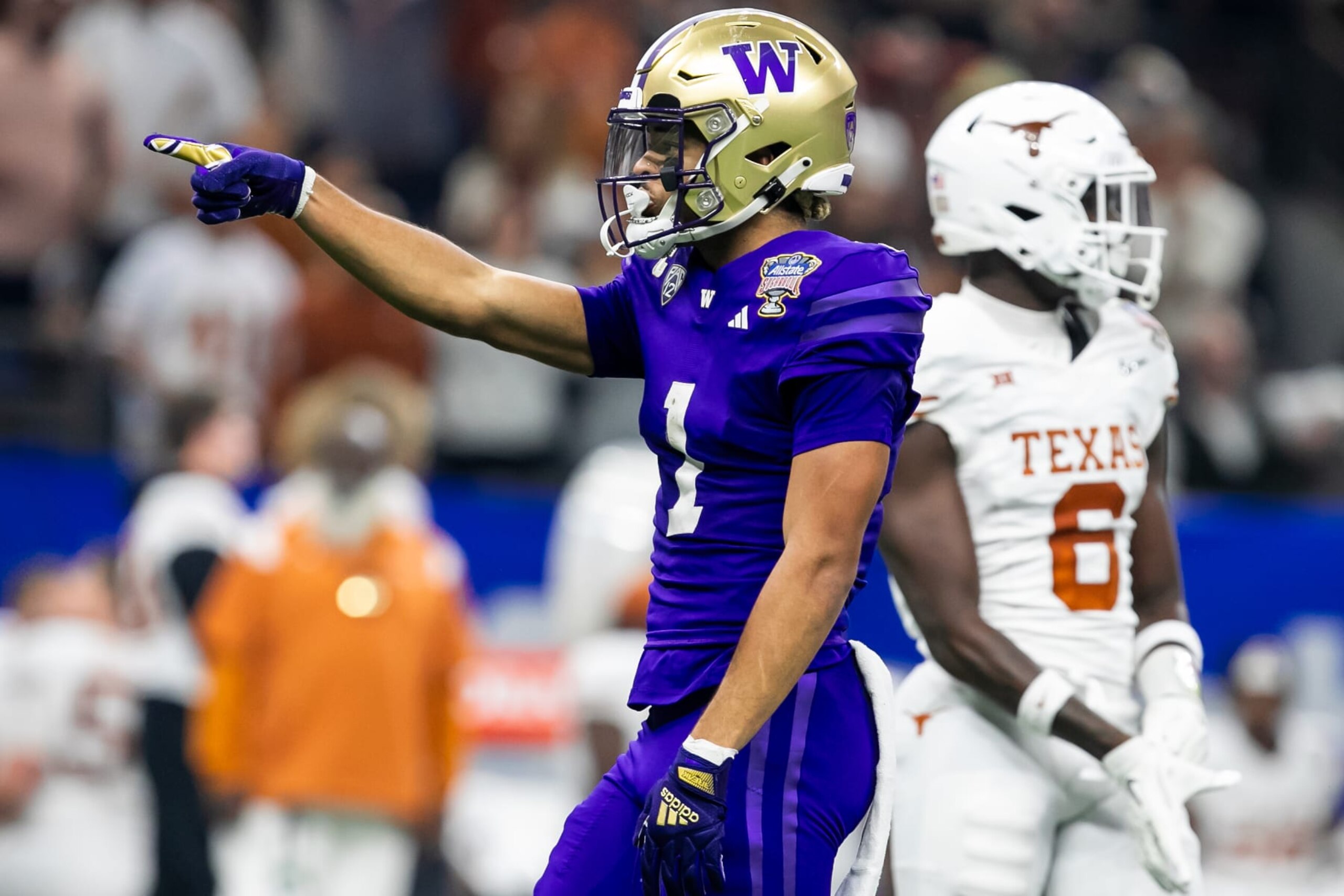 NEW ORLEANS, LA - JANUARY 01: Washington wide receiver Rome Odunze (1) signals a first down after a completed catch during the Allstate Sugar Bowl playoff game between the Texas Longhorns and the Washington Huskies on Monday, January 1, 2024 at Caesars Superdome in New Orleans, LA.  (Photo by Nick Tre. Smith/Icon Sportswire via Getty Images)