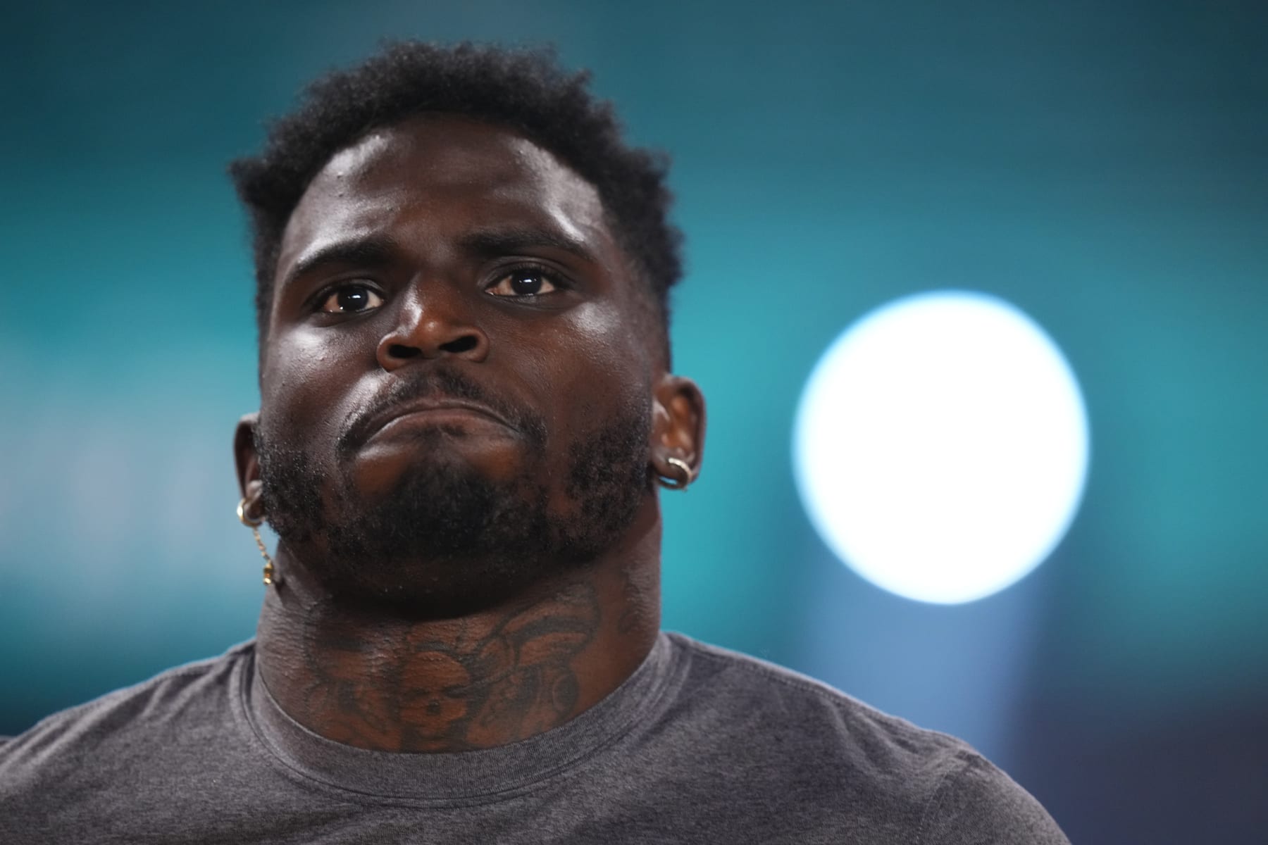 MIAMI GARDENS, FLORIDA - JANUARY 07: Tyreek Hill #10 of the Miami Dolphins warms up prior to a game against the Buffalo Bills at Hard Rock Stadium on January 07, 2024 in Miami Gardens, Florida. (Photo by Rich Storry/Getty Images)