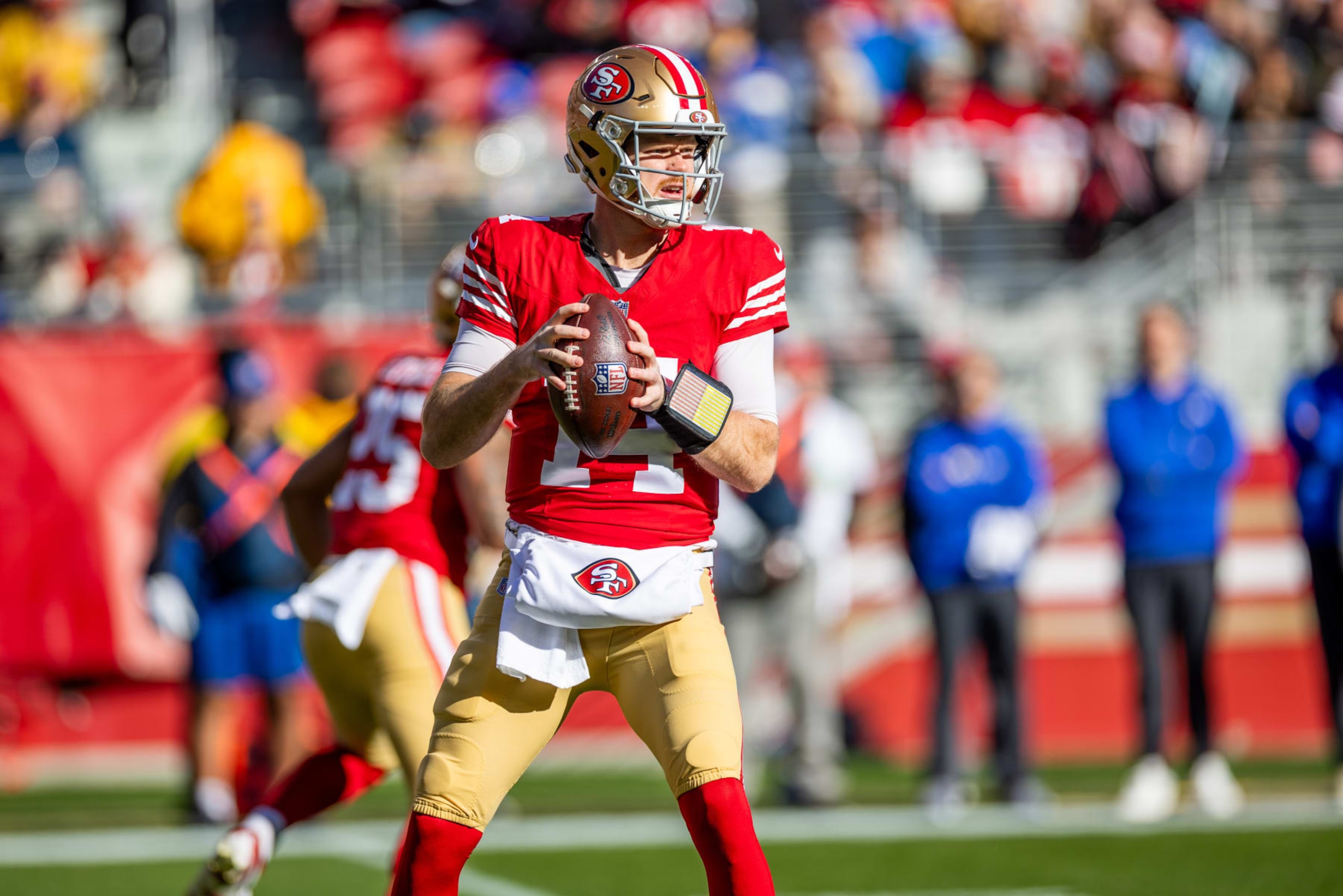 SANTA CLARA, CA - JANUARY 07: San Francisco 49ers quarterback Sam Darnold (14) drops back to pass during the NFL professional football game between the Los Angeles Rams and San Francisco 49ers on January 7, 2024 at Lev's Stadium in Santa Clara, CA. (Photo by Bob Kupbens/Icon Sportswire via Getty Images)