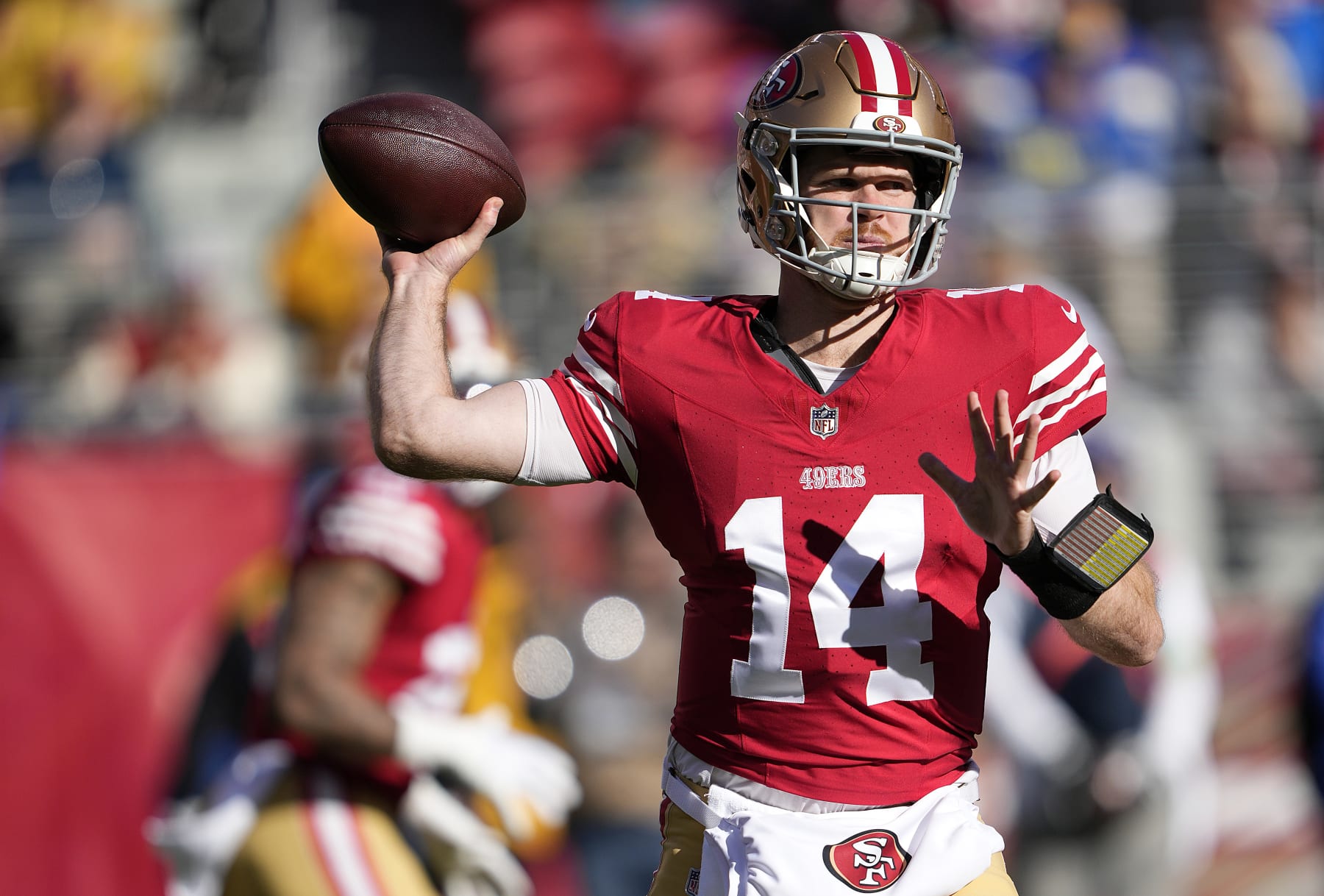 SANTA CLARA, CALIFORNIA - JANUARY 07: Sam Darnold #14 of the San Francisco 49ers looks to pass in the first half during a game against the Los Angeles Rams at Levi's Stadium on January 07, 2024 in Santa Clara, California. (Photo by Thearon W. Henderson/Getty Images)