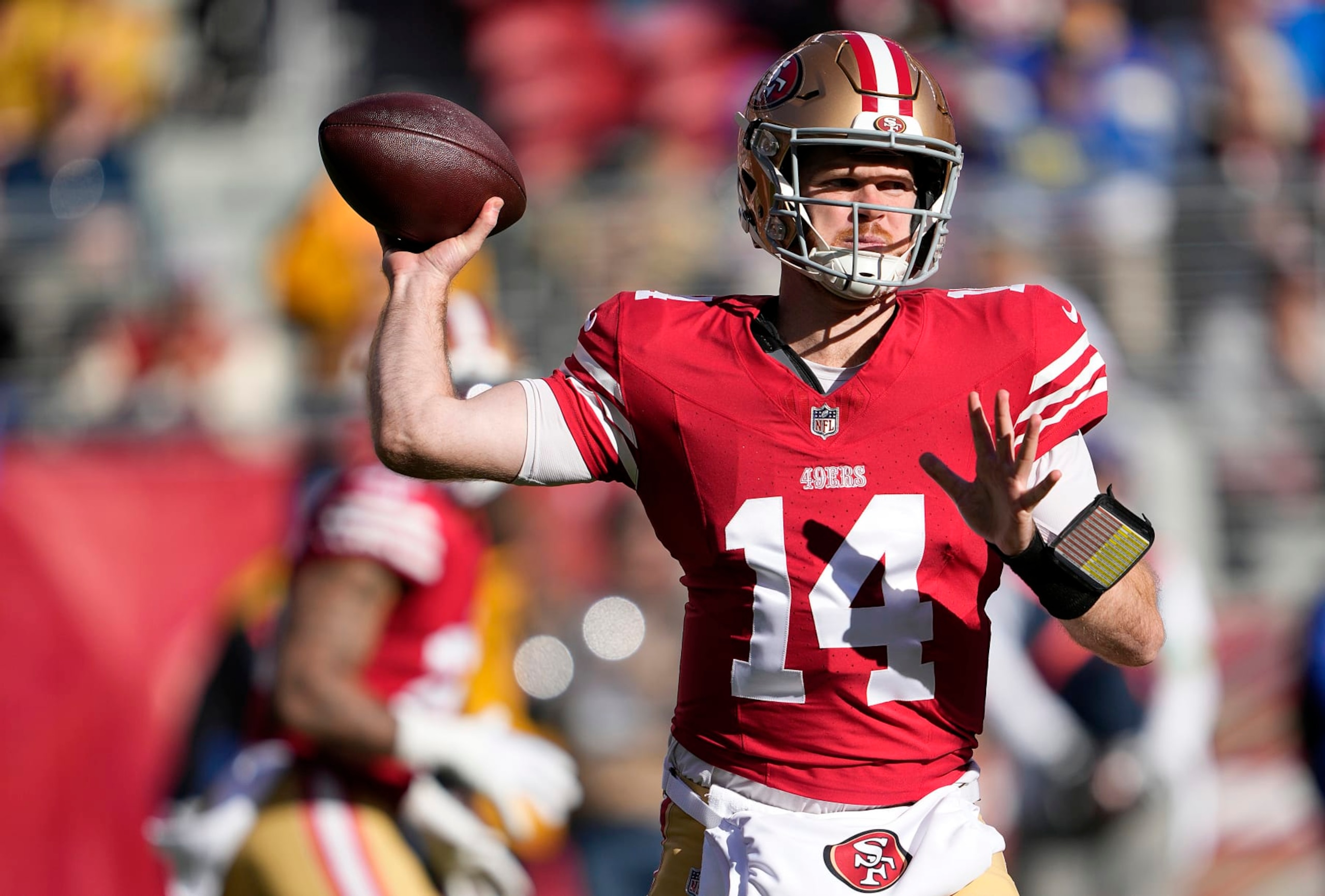 SANTA CLARA, CALIFORNIA - JANUARY 07: Sam Darnold #14 of the San Francisco 49ers looks to pass in the first half during a game against the Los Angeles Rams at Levi's Stadium on January 07, 2024 in Santa Clara, California. (Photo by Thearon W. Henderson/Getty Images)