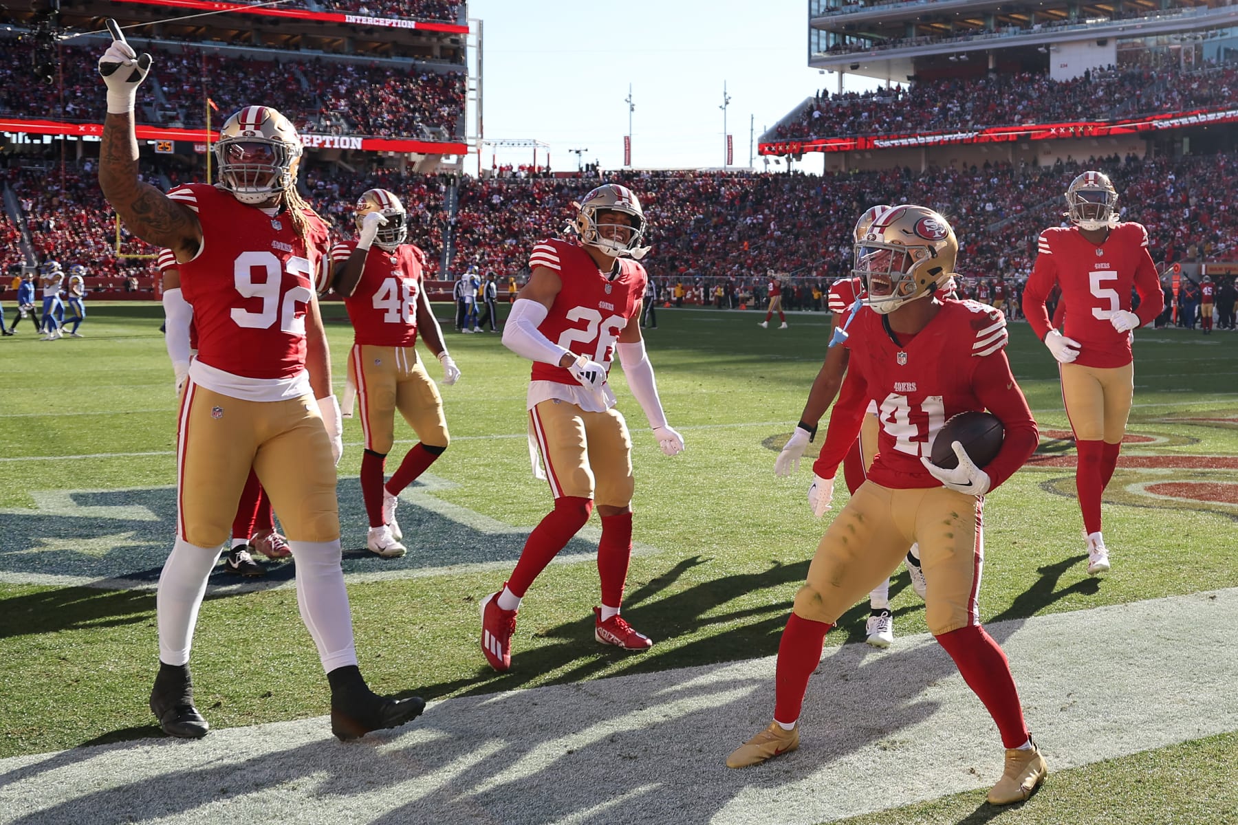 SANTA CLARA, CALIFORNIA - JANUARY 07: Tayler Hawkins #41 of the San Francisco 49ers celebrates with teammates after an interception at Levi's Stadium on January 07, 2024 in Santa Clara, California. (Photo by Ezra Shaw/Getty Images)