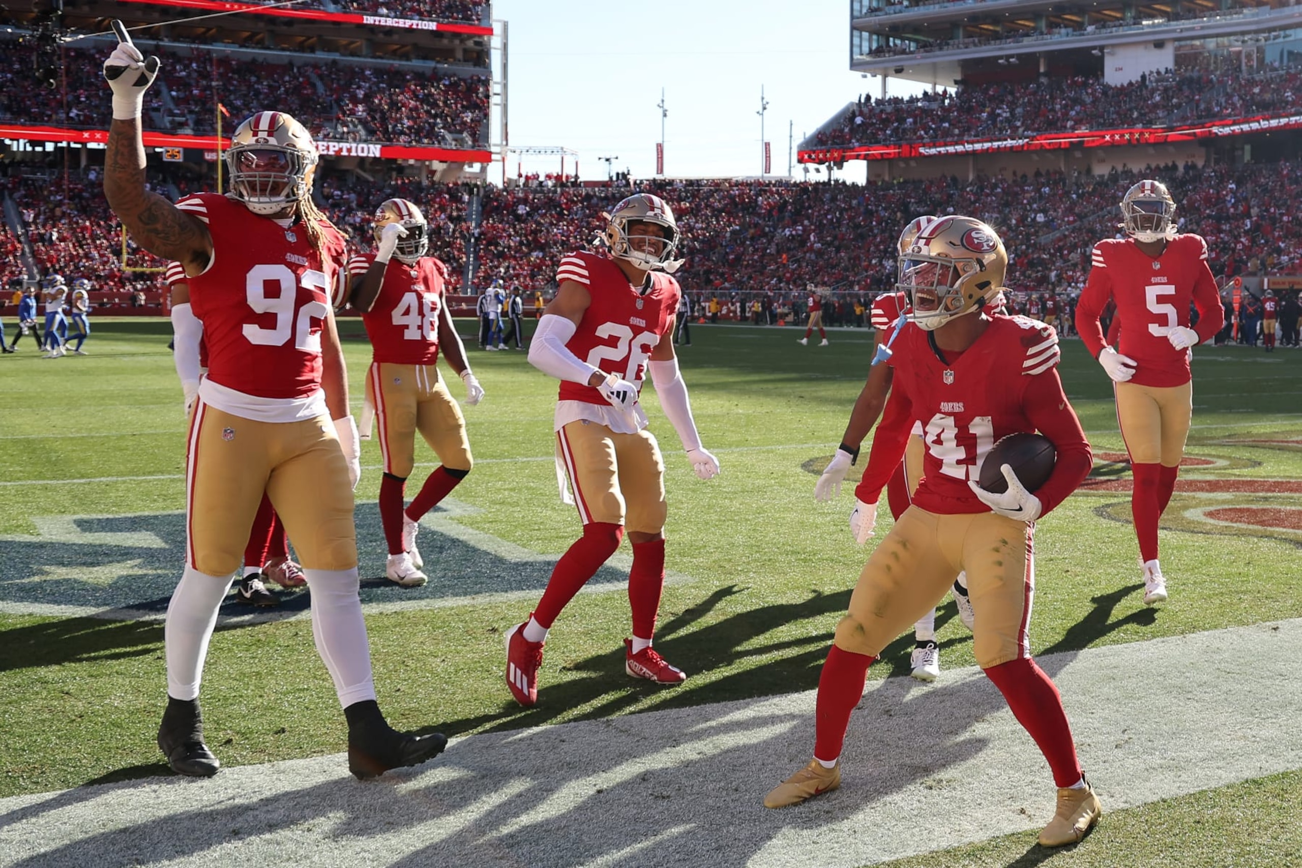 SANTA CLARA, CALIFORNIA - JANUARY 07: Tayler Hawkins #41 of the San Francisco 49ers celebrates with teammates after an interception at Levi's Stadium on January 07, 2024 in Santa Clara, California. (Photo by Ezra Shaw/Getty Images)
