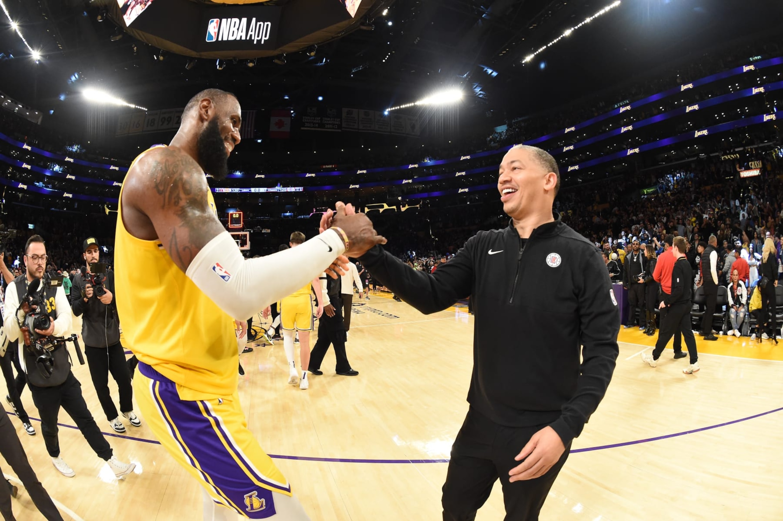 LOS ANGELES, CA - NOVEMBER 1: LeBron James #23 of the Los Angeles Lakers greets Head Coach Tyronn Lue of the LA Clippers after the game on November 1, 2023 at Crypto.Com Arena in Los Angeles, California. NOTE TO USER: User expressly acknowledges and agrees that, by downloading and/or using this Photograph, user is consenting to the terms and conditions of the Getty Images License Agreement. Mandatory Copyright Notice: Copyright 2023 NBAE (Photo by Andrew D. Bernstein/NBAE via Getty Images)