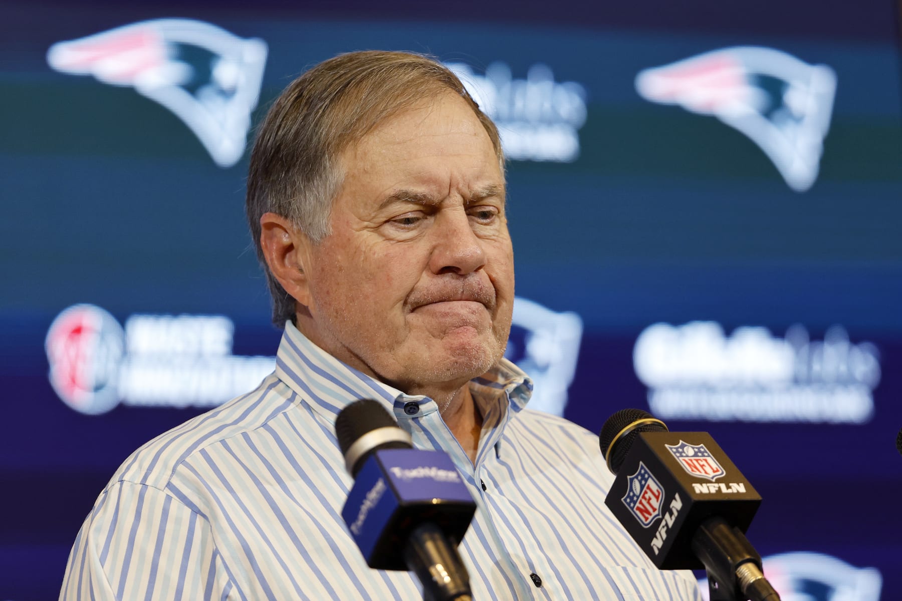 FOXBOROUGH, MASSACHUSETTS - JANUARY 07: New England Patriots head coach Bill Belichick speaks during a press conference after a game against the New York Jets at Gillette Stadium on January 07, 2024 in Foxborough, Massachusetts. (Photo by Winslow Townson/Getty Images)