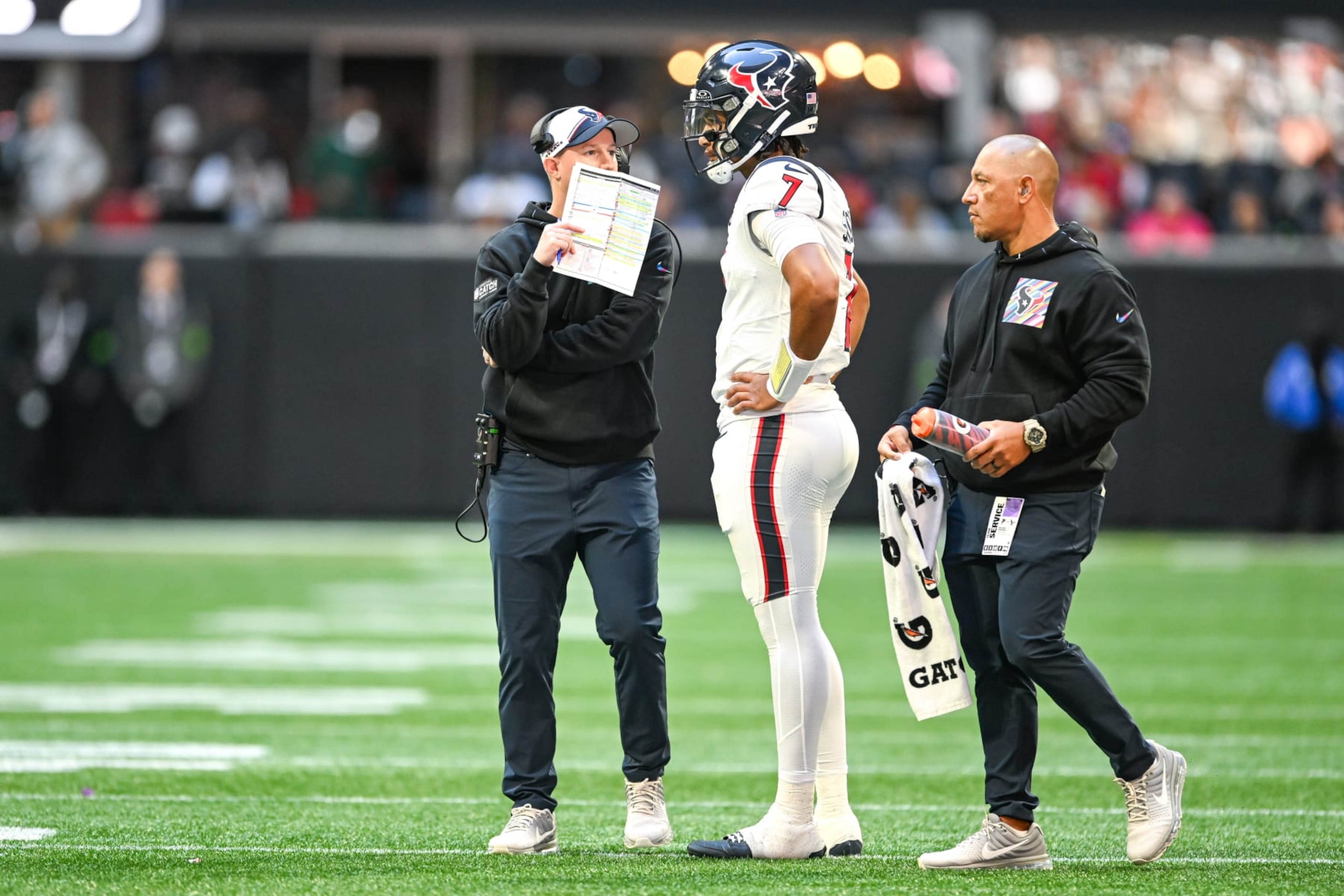 Texans QB C.J. Stroud talks with offensive coordinator Bobby Slowik Texans QB C.J. Stroud talks with offensive coordinator Bobby Slowik