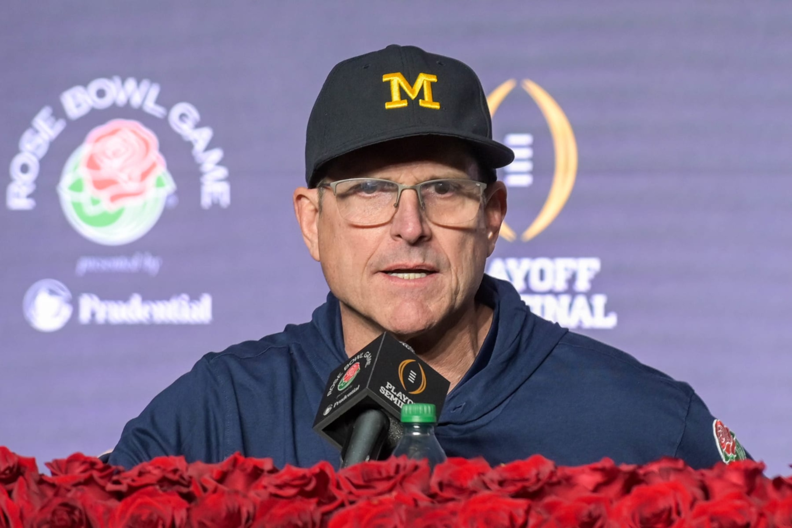 PASADENA, CALIFORNIA - JANUARY 01: Head Coach Jim Harbaugh of the Michigan Wolverines speaks to media during the post game press conference after the CFP Semifinal Rose Bowl Game against the Alabama Crimson Tide at Rose Bowl Stadium on January 01, 2024 in Pasadena, California. The Michigan Wolverines won the game 27-20 in overtime. (Photo by Aaron J. Thornton/Getty Images)