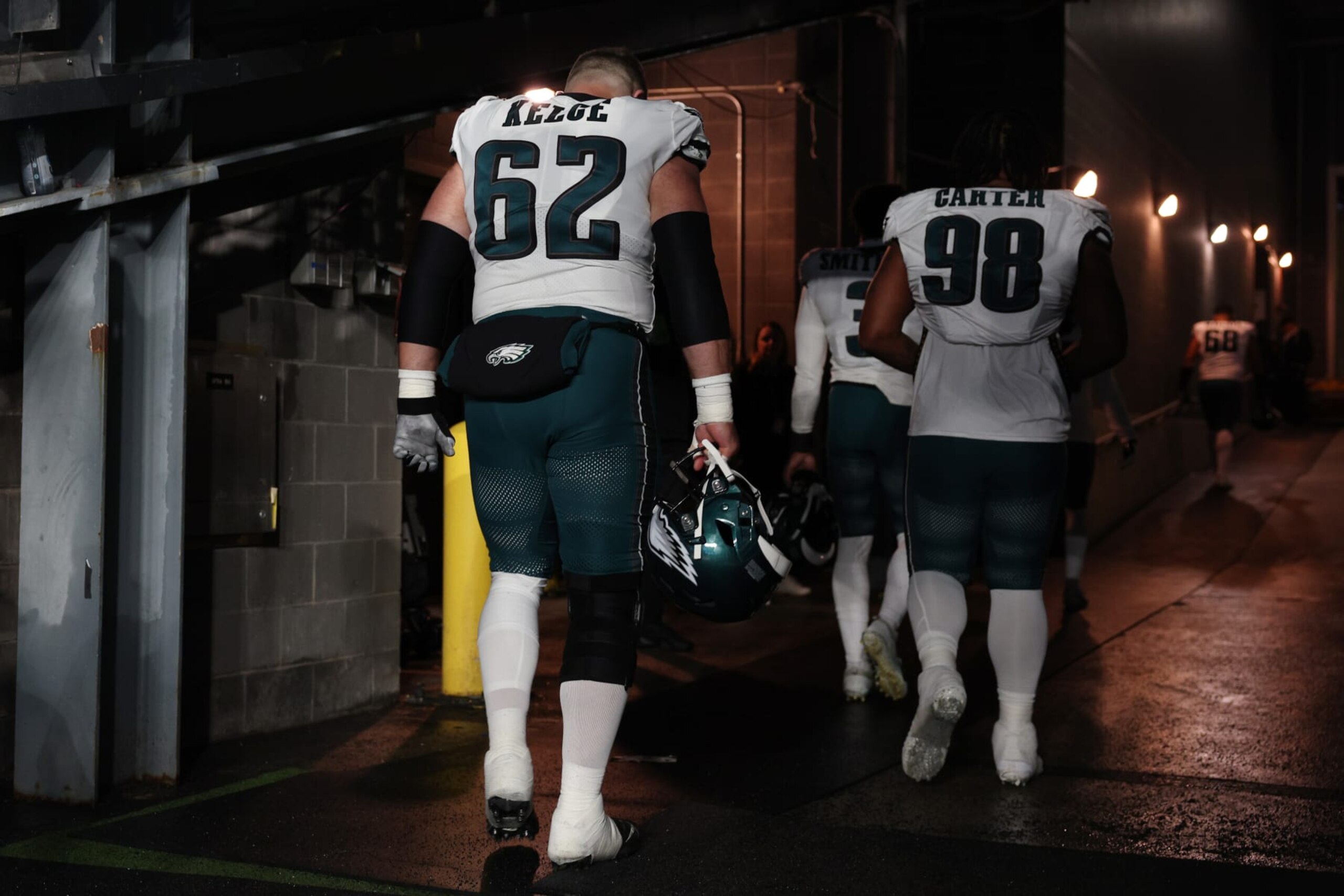 EAST RUTHERFORD, NEW JERSEY - JANUARY 07: Jason Kelce #62 of the Philadelphia Eagles walks off the field after a loss to the New York Giants at MetLife Stadium on January 07, 2024 in East Rutherford, New Jersey. (Photo by Elsa/Getty Images)