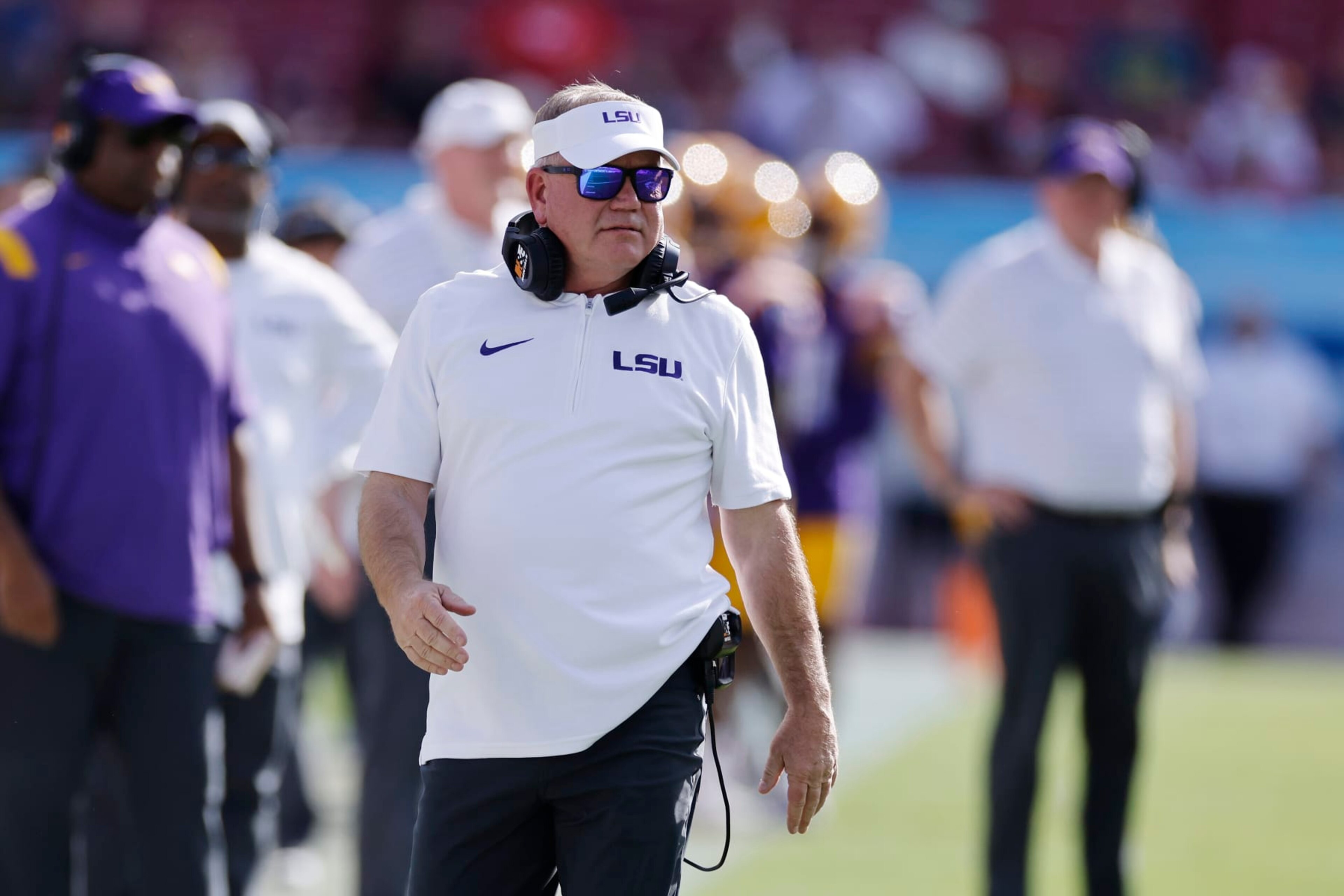 TAMPA, FL - JANUARY 01: LSU Tigers head coach Brian Kelly looks on during the ReliaQuest Bowl against the Wisconsin Badgers on January 1, 2024 at Raymond James Stadium in Tampa, Florida. (Photo by Joe Robbins/Icon Sportswire via Getty Images) TAMPA, FL - JANUARY 01: LSU Tigers head coach Brian Kelly looks on during the ReliaQuest Bowl against the Wisconsin Badgers on January 1, 2024 at Raymond James Stadium in Tampa, Florida. (Photo by Joe Robbins/Icon Sportswire via Getty Images)