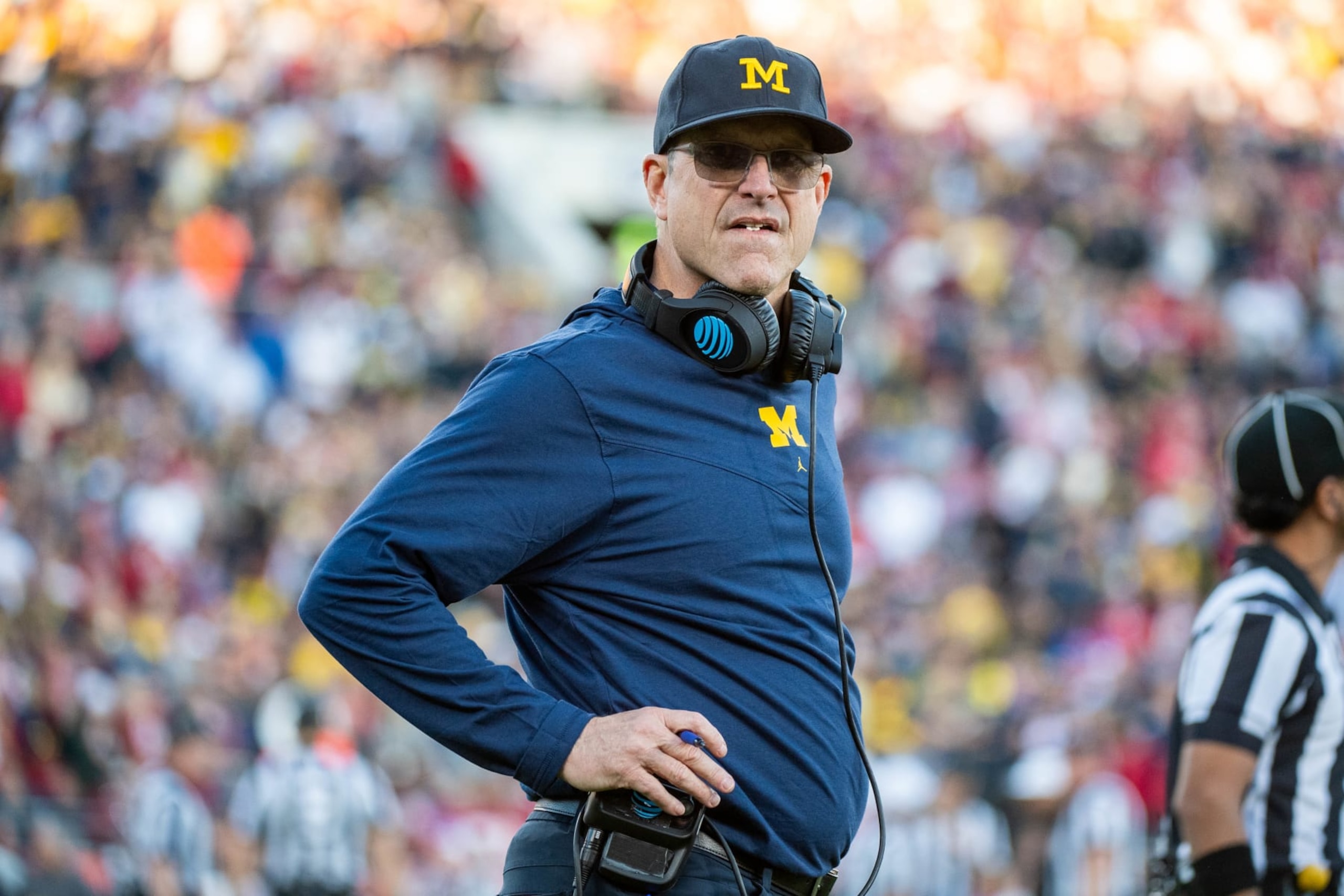 PASADENA, CALIFORNIA - JANUARY 01: Head coach Jim Harbaugh of the Michigan Wolverines looks on from the sideline during the second half of the CFP Semifinal Rose Bowl Game against the Alabama Crimson Tide at Rose Bowl Stadium on January 01, 2024 in Pasadena, California. The Michigan Wolverines won the game 27-20 in overtime. (Photo by Aaron J. Thornton/Getty Images)