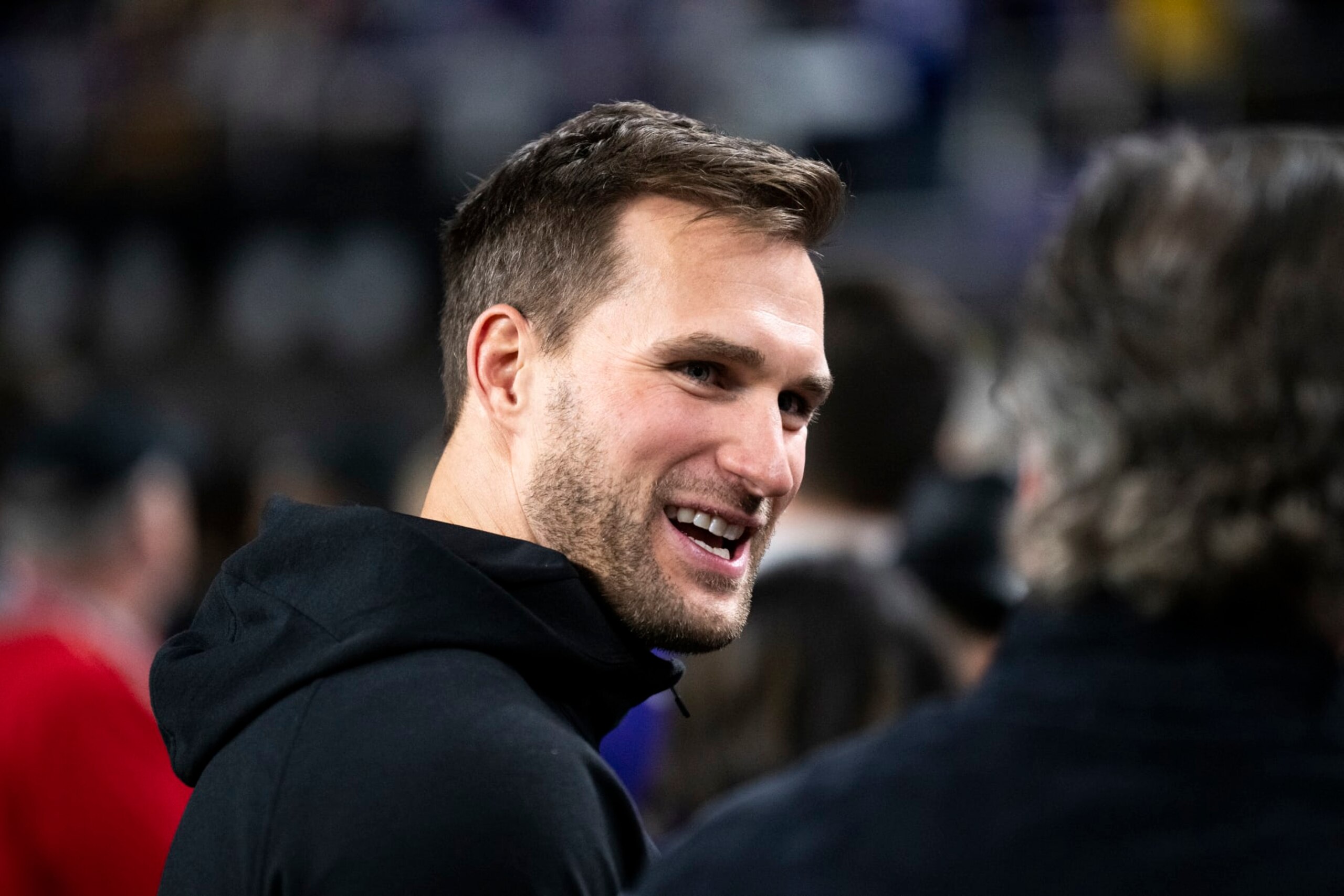 MINNEAPOLIS, MINNESOTA - DECEMBER 31: Kirk Cousins #8 of the Minnesota Vikings looks on from the sidelines before the game against the Green Bay Packers at U.S. Bank Stadium on December 31, 2023 in Minneapolis, Minnesota. (Photo by Stephen Maturen/Getty Images)