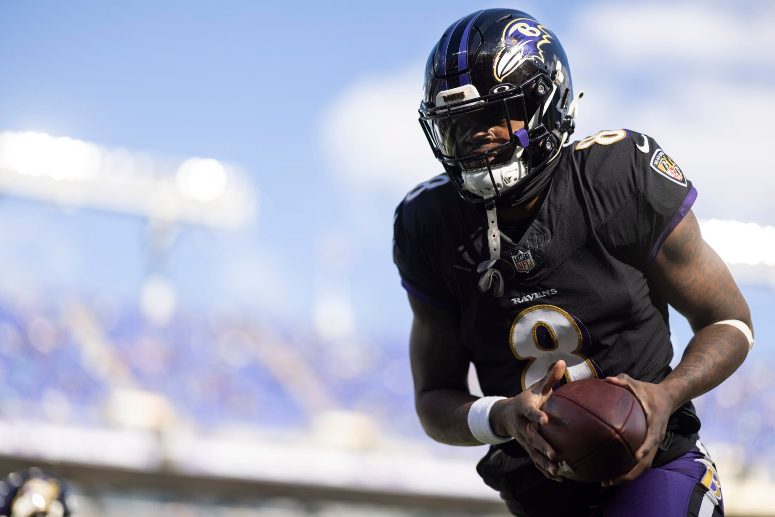 BALTIMORE, MARYLAND - DECEMBER 31: Lamar Jackson #8 of the Baltimore Ravens drops back to pass as he warms up prior to an NFL football game between the Baltimore Ravens and the Miami Dolphins at M&T Bank Stadium on December 31, 2023 in Baltimore, Maryland. (Photo by Michael Owens/Getty Images)