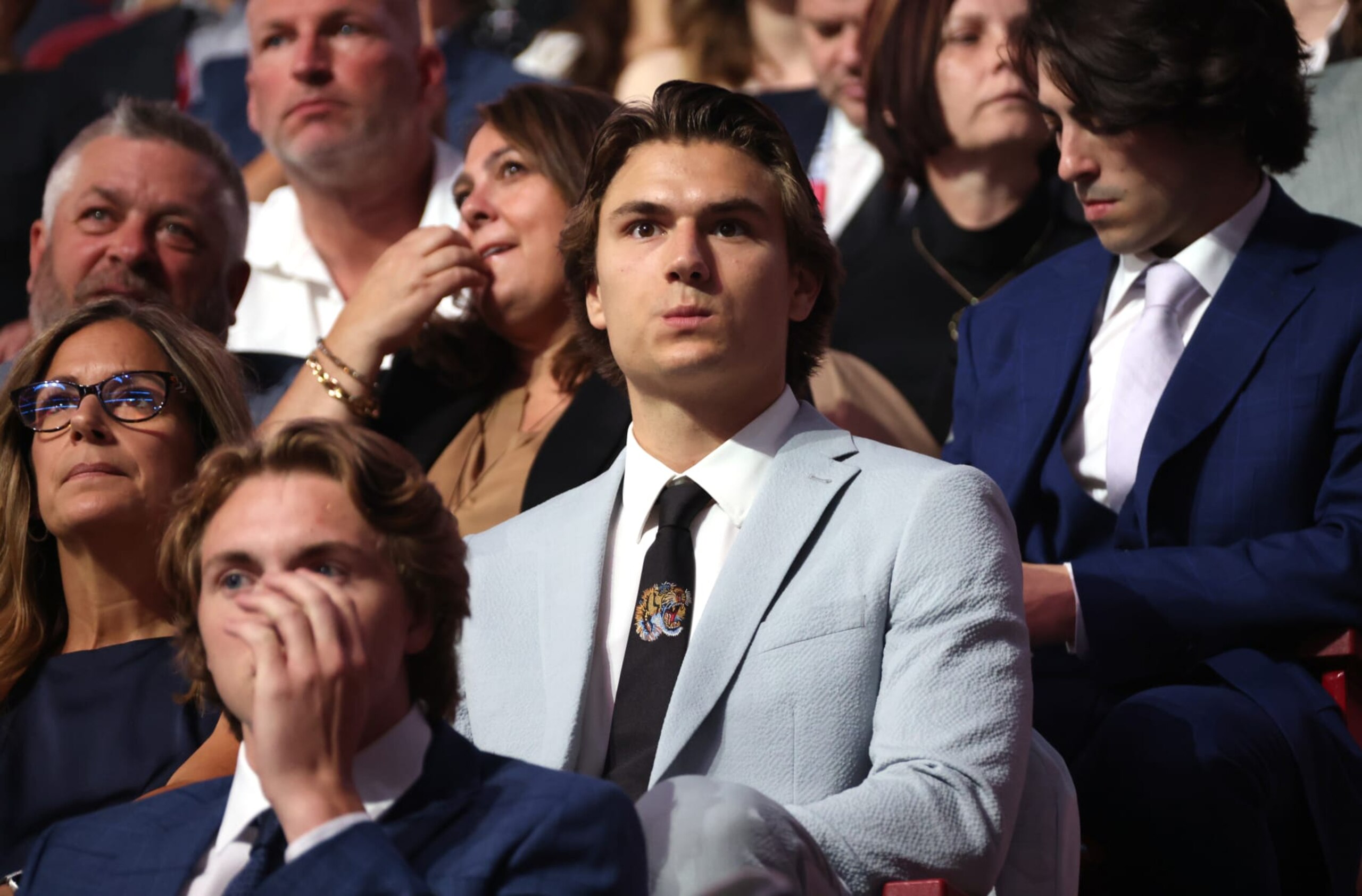MONTREAL, QUEBEC - JULY 07: NHL prospect Cutter Gauthier looks on from his seat during the first round of the 2022 Upper Deck NHL Draft at Bell Centre on July 07, 2022 in Montreal, Quebec. (Photo by Dave Sandford/NHLI via Getty Images)