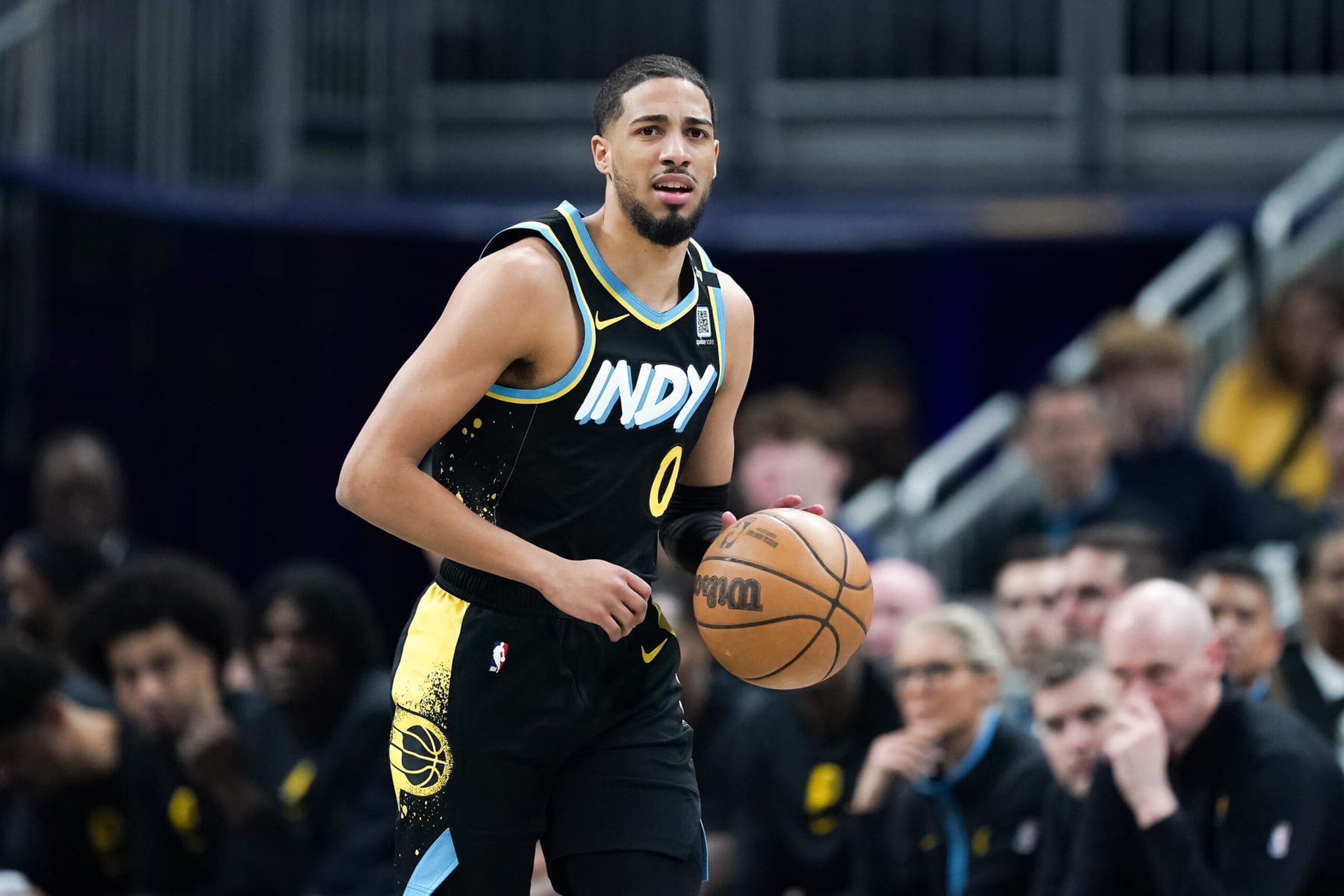 INDIANAPOLIS, INDIANA - JANUARY 06: Tyrese Haliburton #0 of the Indiana Pacers dribbles the ball in the first quarter against the Boston Celtics at Gainbridge Fieldhouse on January 06, 2024 in Indianapolis, Indiana. NOTE TO USER: User expressly acknowledges and agrees that, by downloading and or using this photograph, User is consenting to the terms and conditions of the Getty Images License Agreement. (Photo by Dylan Buell/Getty Images)