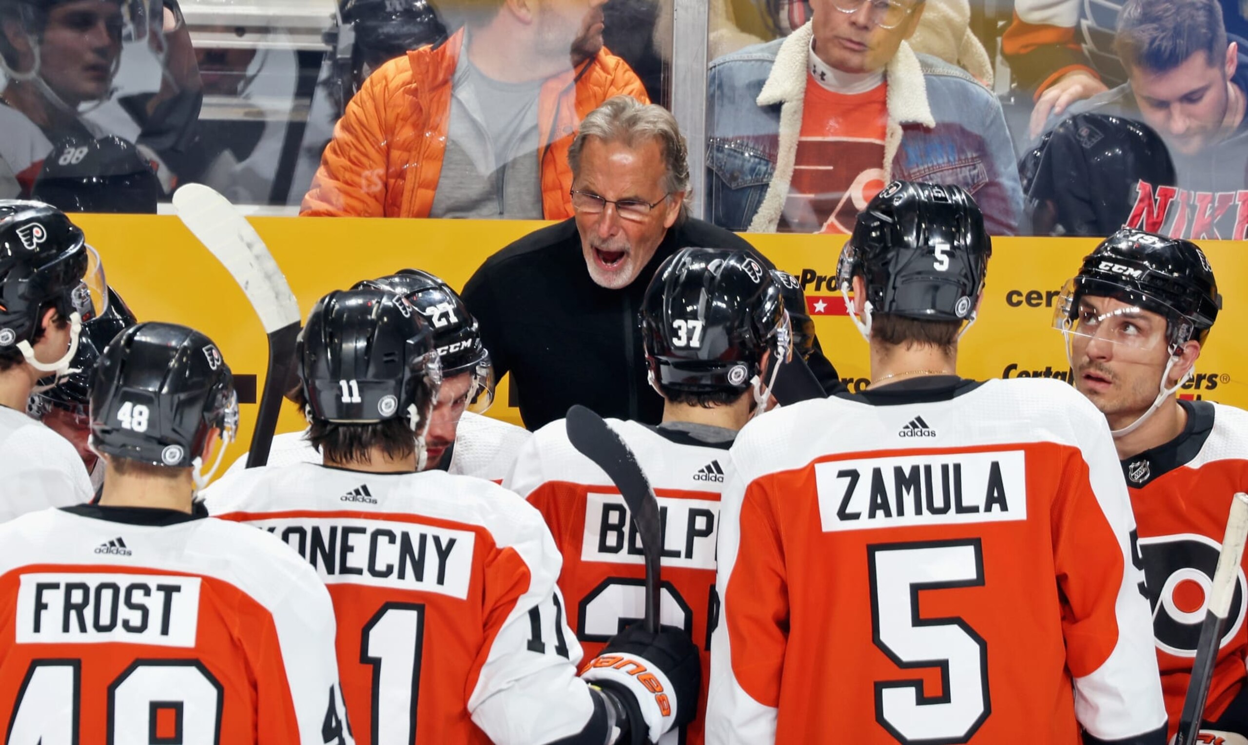 PHILADELPHIA, PENNSYLVANIA - NOVEMBER 01: Head Coach of the Philadelphia Flyers John Tortorella speaks with his team during a first period stoppage in play against the Buffalo Sabres at the Wells Fargo Center on November 1, 2023 in Philadelphia, Pennsylvania.  (Photo by Len Redkoles/NHLI via Getty Images)