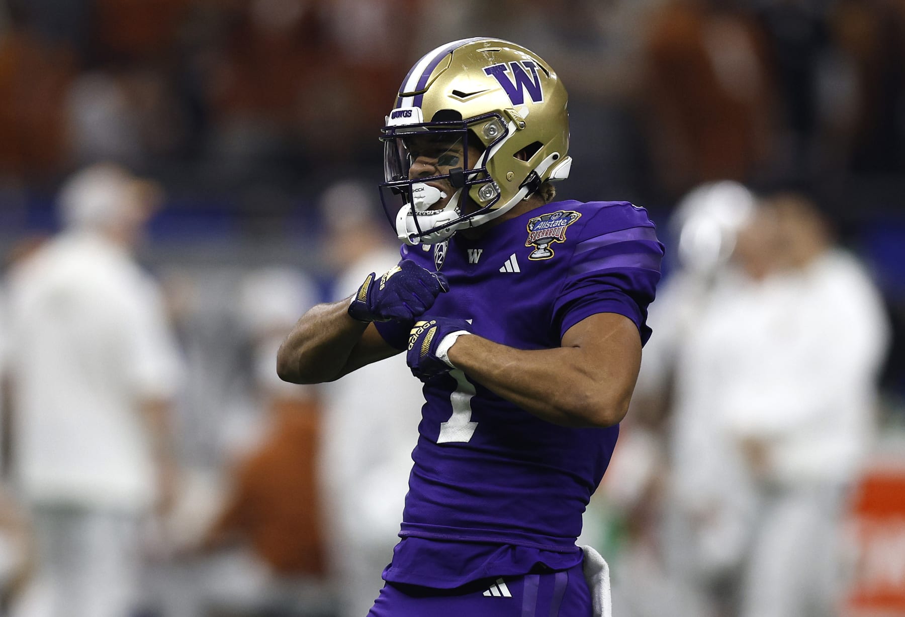NEW ORLEANS, LOUISIANA - JANUARY 01: Rome Odunze #1 of the Washington Huskies reacts during the first half against the Texas Longhorns during the CFP Semifinal Allstate Sugar Bowl at Caesars Superdome on January 01, 2024 in New Orleans, Louisiana. (Photo by Sean Gardner/Getty Images)