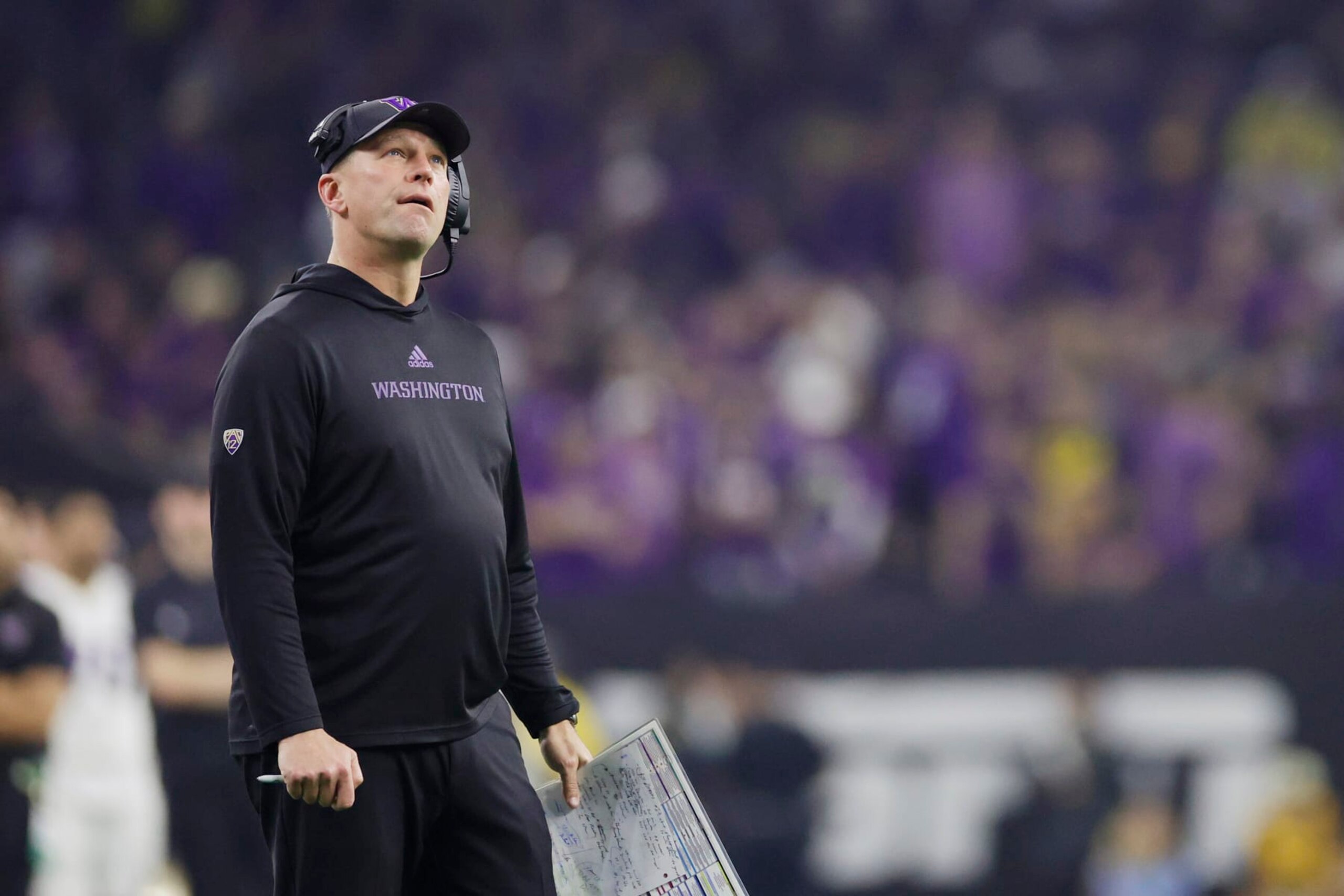 HOUSTON, TEXAS - JANUARY 08: Head coach Kalen DeBoer of the Washington Huskies looks on in the first half against the Michigan Wolverines during the 2024 CFP National Championship game at NRG Stadium on January 08, 2024 in Houston, Texas. (Photo by Carmen Mandato/Getty Images)