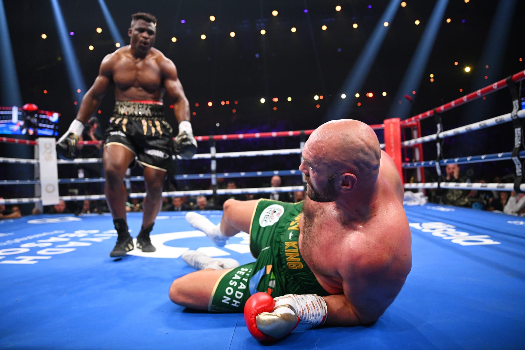RIYADH, SAUDI ARABIA - OCTOBER 28: Francis Ngannou knocks down Tyson Fury during the Heavyweight fight between Tyson Fury and Francis Ngannou at Boulevard Hall on October 28, 2023 in Riyadh, Saudi Arabia. (Photo by Justin Setterfield/Getty Images) RIYADH, SAUDI ARABIA - OCTOBER 28: Francis Ngannou knocks down Tyson Fury during the Heavyweight fight between Tyson Fury and Francis Ngannou at Boulevard Hall on October 28, 2023 in Riyadh, Saudi Arabia. (Photo by Justin Setterfield/Getty Images)