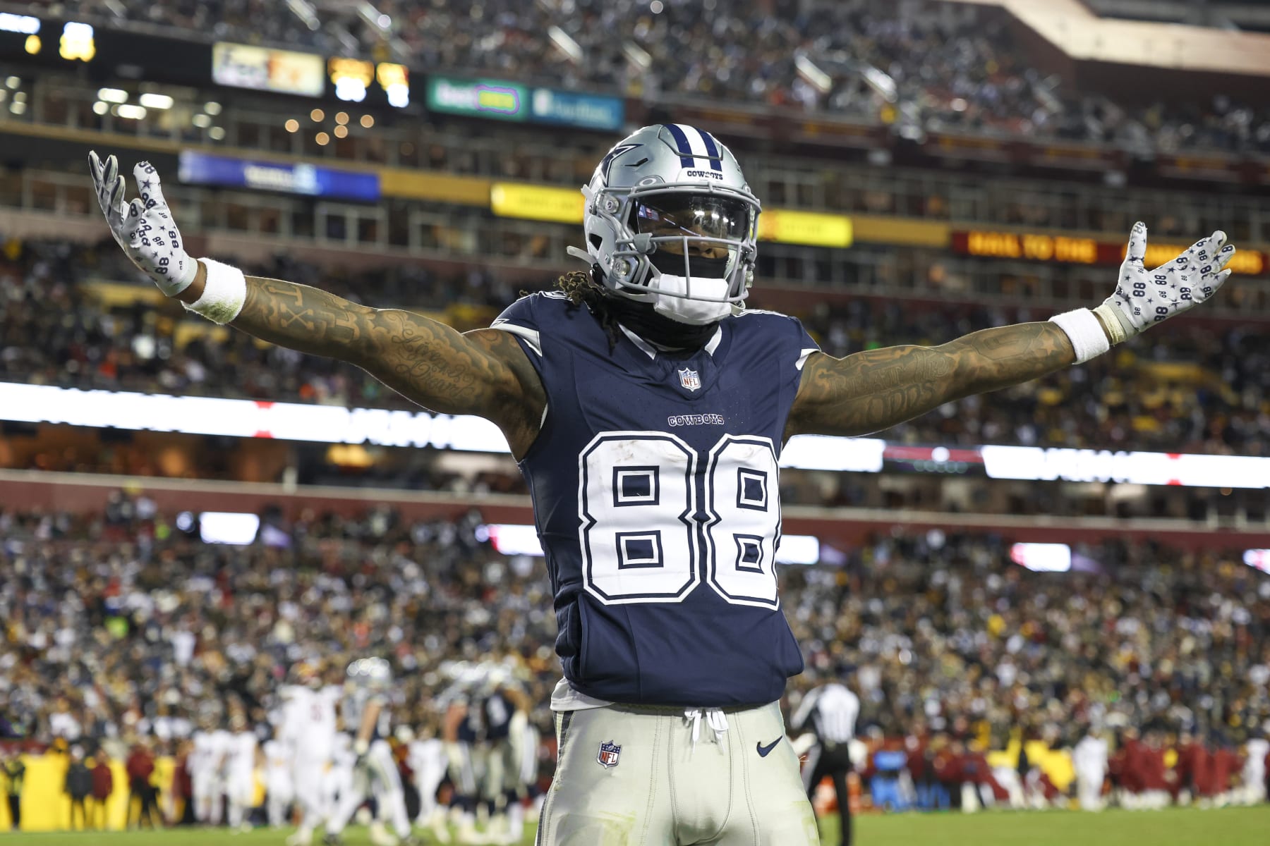 LANDOVER, MARYLAND - JANUARY 07: CeeDee Lamb #88 of the Dallas Cowboys celebrates a touchdown during an NFL football game against the Washington Commanders at FedExField on January 7, 2024 in Landover, Maryland. (Photo by Kara Durrette/Getty Images)
