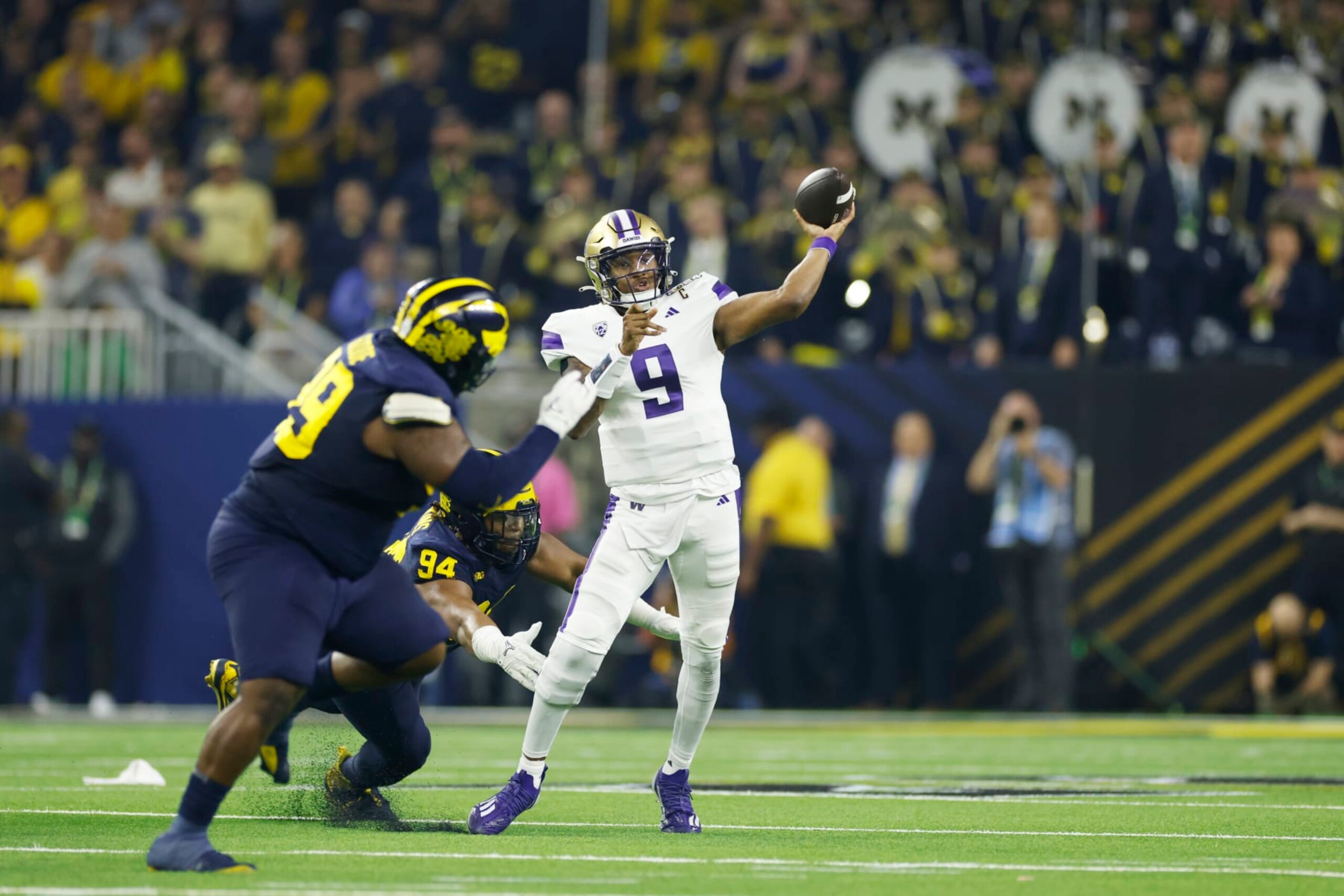 HOUSTON, TX - JANUARY 08: QB Michael Penix Jr. (9) of the Washington Huskies passes during the Michigan Wolverines versus the Washington Huskies CFP National Championship game on January 8, 2024, at NRG Stadium in Houston, TX. (Photo by Joe Robbins/Icon Sportswire via Getty Images)