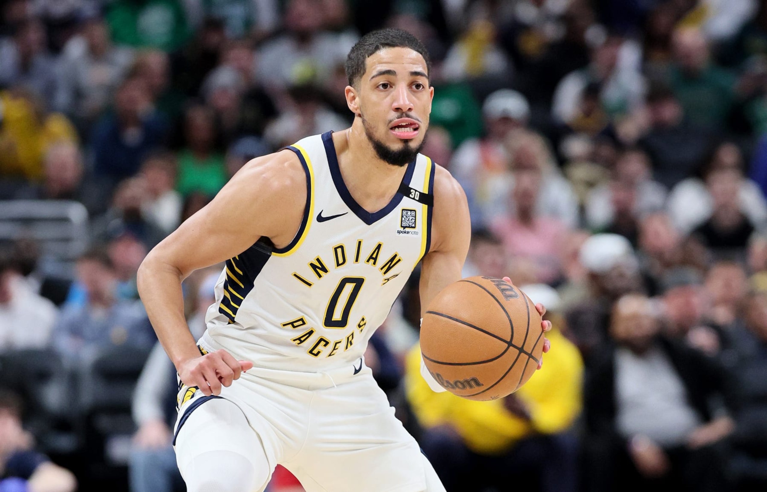 INDIANAPOLIS, INDIANA - JANUARY 08:   Tyrese Haliburton #0 of the Indiana Pacers dribbles the ball in the first half against the Boston Celtics at Gainbridge Fieldhouse on January 08, 2024 in Indianapolis, Indiana.    NOTE TO USER: User expressly acknowledges and agrees that, by downloading and or using this photograph, User is consenting to the terms and conditions of the Getty Images License Agreement.  (Photo by Andy Lyons/Getty Images)