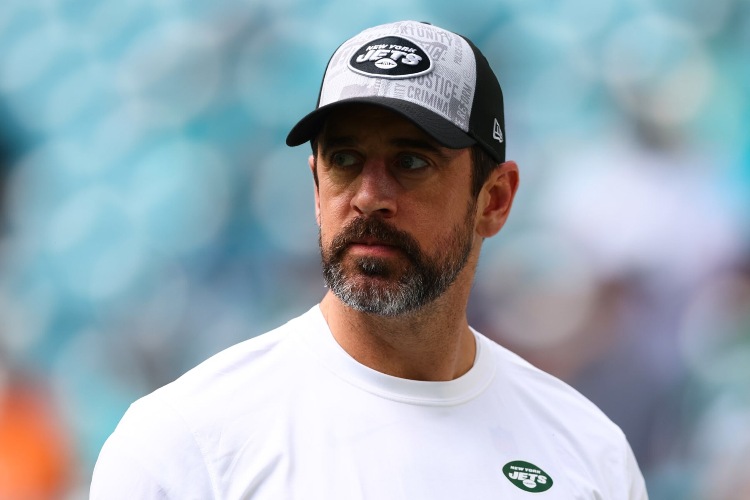 MIAMI GARDENS, FLORIDA - DECEMBER 17: Aaron Rodgers #8 of the New York Jets looks on prior to a game against the Miami Dolphins at Hard Rock Stadium on December 17, 2023 in Miami Gardens, Florida. (Photo by Megan Briggs/Getty Images)