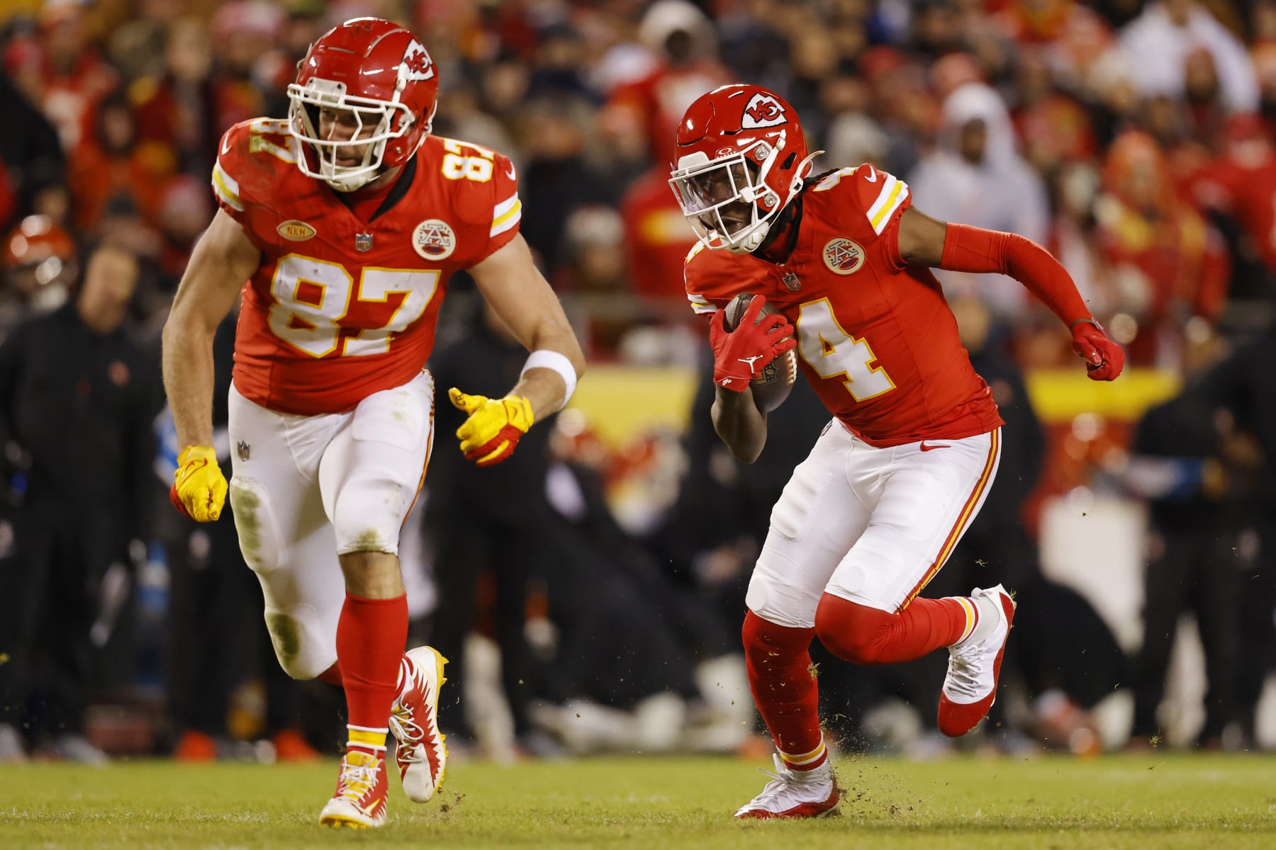 KANSAS CITY, MISSOURI - DECEMBER 31: Rashee Rice #4 of the Kansas City Chiefs runs with the ball during the third quarter against the Cincinnati Bengals at GEHA Field at Arrowhead Stadium on December 31, 2023 in Kansas City, Missouri. (Photo by David Eulitt/Getty Images)
