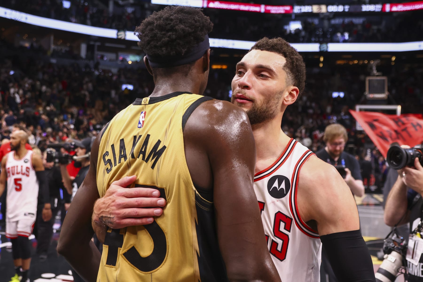 TORONTO, CANADA - NOVEMBER 24:  Pascal Siakam #43 of the Toronto Raptors & Zach LaVine #8 of the Chicago Bulls embrace after the game during the In-Season Tournament on November 24, 2023 at the Scotiabank Arena in Toronto, Ontario, Canada.  NOTE TO USER: User expressly acknowledges and agrees that, by downloading and or using this Photograph, user is consenting to the terms and conditions of the Getty Images License Agreement.  Mandatory Copyright Notice: Copyright 2023 NBAE (Photo by Vaughn Ridley/NBAE via Getty Images)