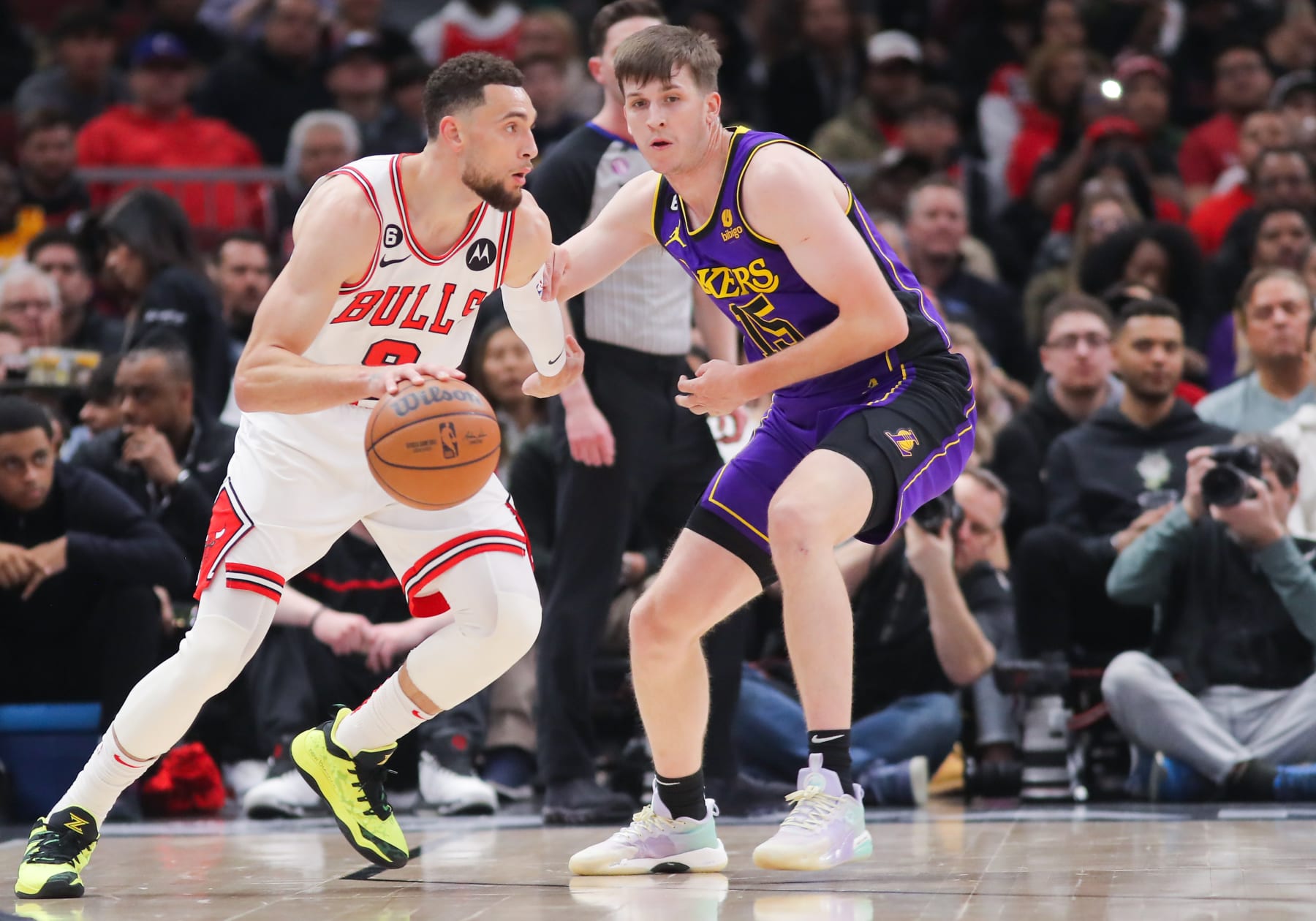 CHICAGO, IL - MARCH 29: Los Angeles Lakers guard Austin Reaves (15) posts up against Chicago Bulls guard Zach LaVine (8) during a NBA game between the Los Angeles Lakers and the Chicago Bulls on March 29, 2023 at the United Center in Chicago, IL. (Photo by Melissa Tamez/Icon Sportswire via Getty Images)