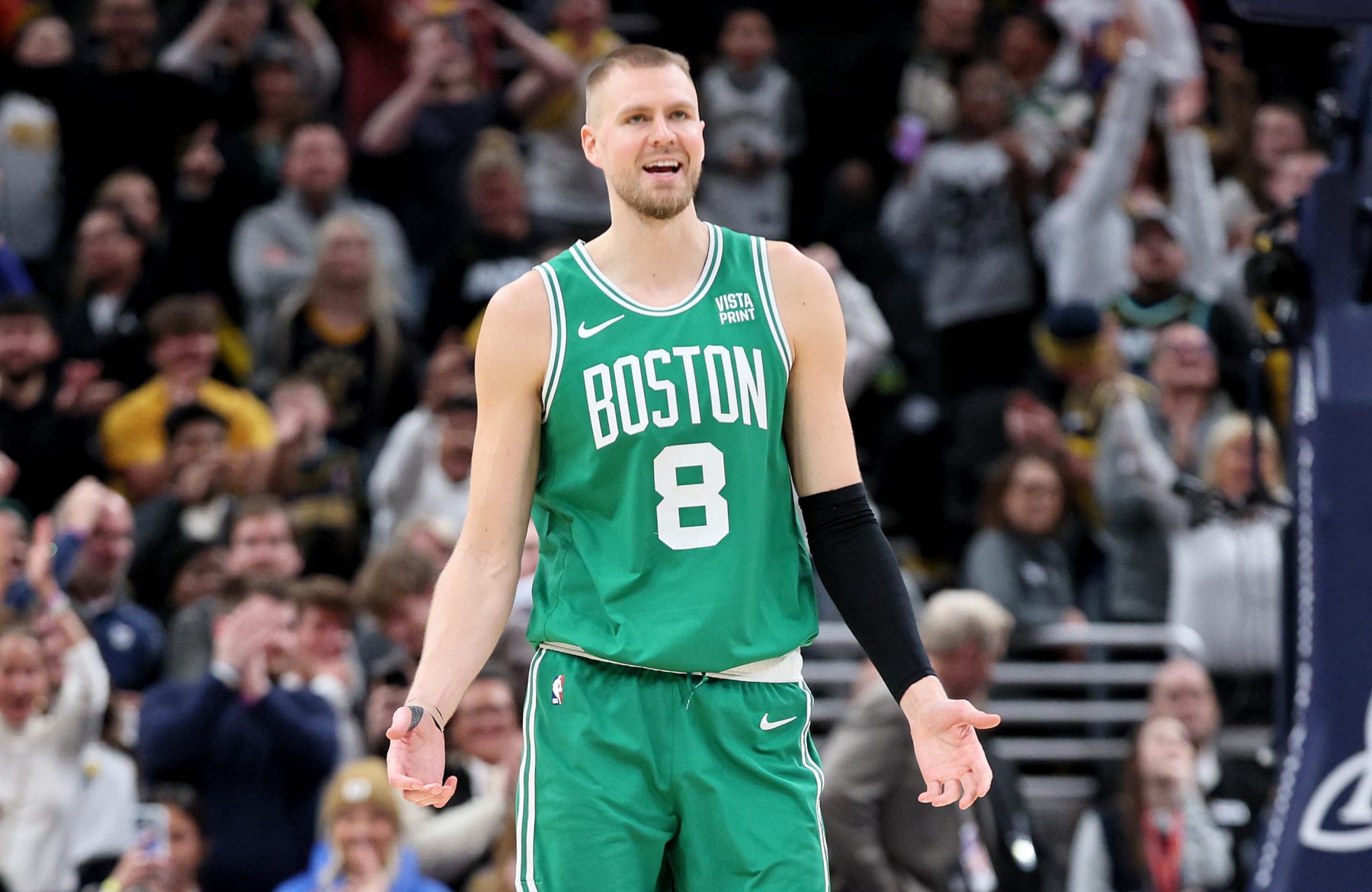 INDIANAPOLIS, INDIANA - JANUARY 08:   Kristaps Porzingis #8 of the Boston Celtics reacts after being charged with a foul in the final second of the 133-131 loss to the Indiana Pacers at Gainbridge Fieldhouse on January 08, 2024 in Indianapolis, Indiana.    NOTE TO USER: User expressly acknowledges and agrees that, by downloading and or using this photograph, User is consenting to the terms and conditions of the Getty Images License Agreement.  (Photo by Andy Lyons/Getty Images)