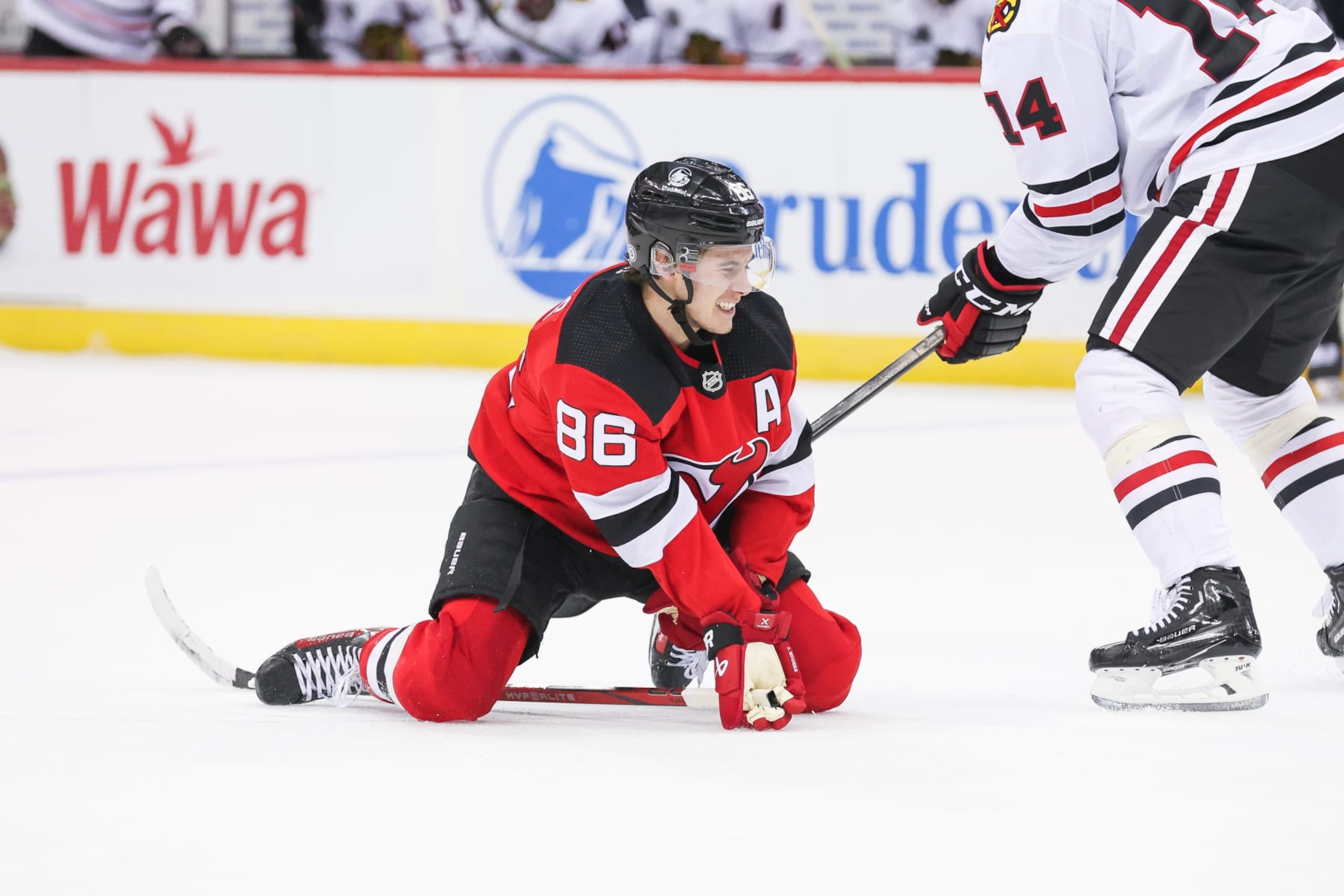 NEWARK, NJ - JANUARY 05: New Jersey Devils center Jack Hughes (86) falls on the ice during a game between the Chicago Blackhawks and New Jersey Devils on January 05, 2024 at Prudential Center in the Newark, New Jersey. (Photo by Andrew Mordzynski/Icon Sportswire via Getty Images) NEWARK, NJ - JANUARY 05: New Jersey Devils center Jack Hughes (86) falls on the ice during a game between the Chicago Blackhawks and New Jersey Devils on January 05, 2024 at Prudential Center in the Newark, New Jersey. (Photo by Andrew Mordzynski/Icon Sportswire via Getty Images)