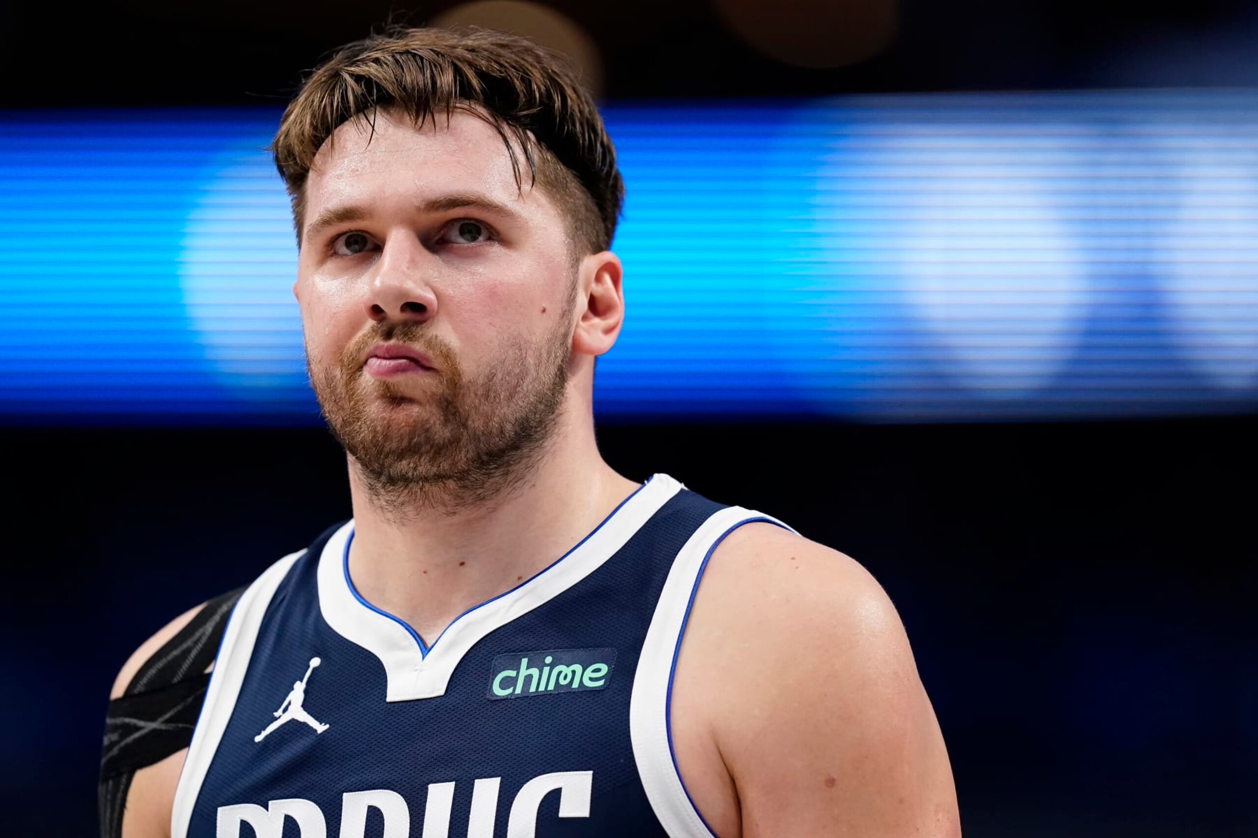 DALLAS, TEXAS - JANUARY 03: Luka Doncic #77 of the Dallas Mavericks looks on during the second half against the Portland Trail Blazers at American Airlines Center on January 03, 2024 in Dallas, Texas. NOTE TO USER: User expressly acknowledges and agrees that, by downloading and or using this photograph, User is consenting to the terms and conditions of the Getty Images License Agreement. (Photo by Sam Hodde/Getty Images)