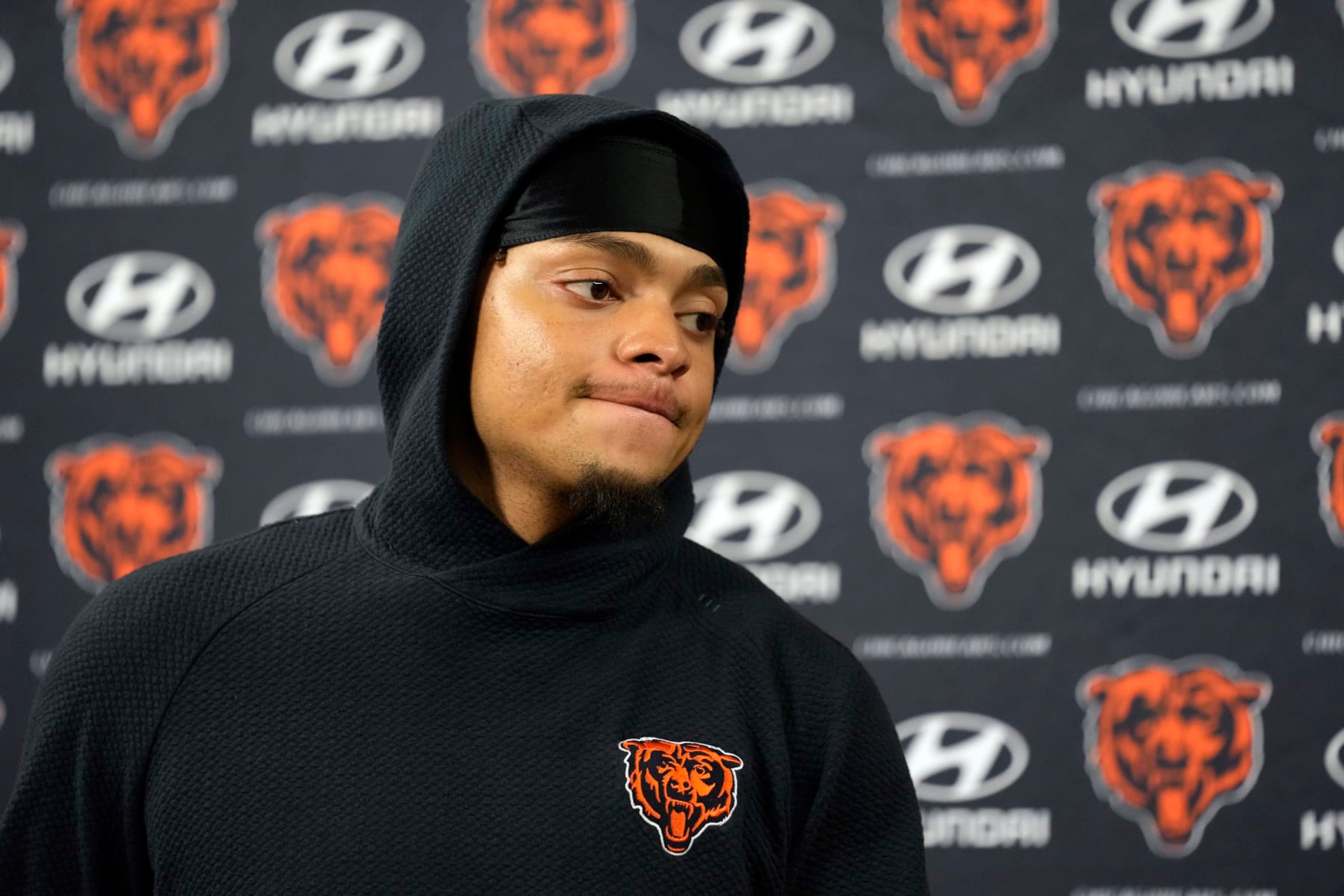 GREEN BAY, WISCONSIN - JANUARY 07: Justin Fields #1 of the Chicago Bears speaks during a press conference after a game against the Green Bay Packers at Lambeau Field on January 07, 2024 in Green Bay, Wisconsin. (Photo by Patrick McDermott/Getty Images) GREEN BAY, WISCONSIN - JANUARY 07: Justin Fields #1 of the Chicago Bears speaks during a press conference after a game against the Green Bay Packers at Lambeau Field on January 07, 2024 in Green Bay, Wisconsin. (Photo by Patrick McDermott/Getty Images)