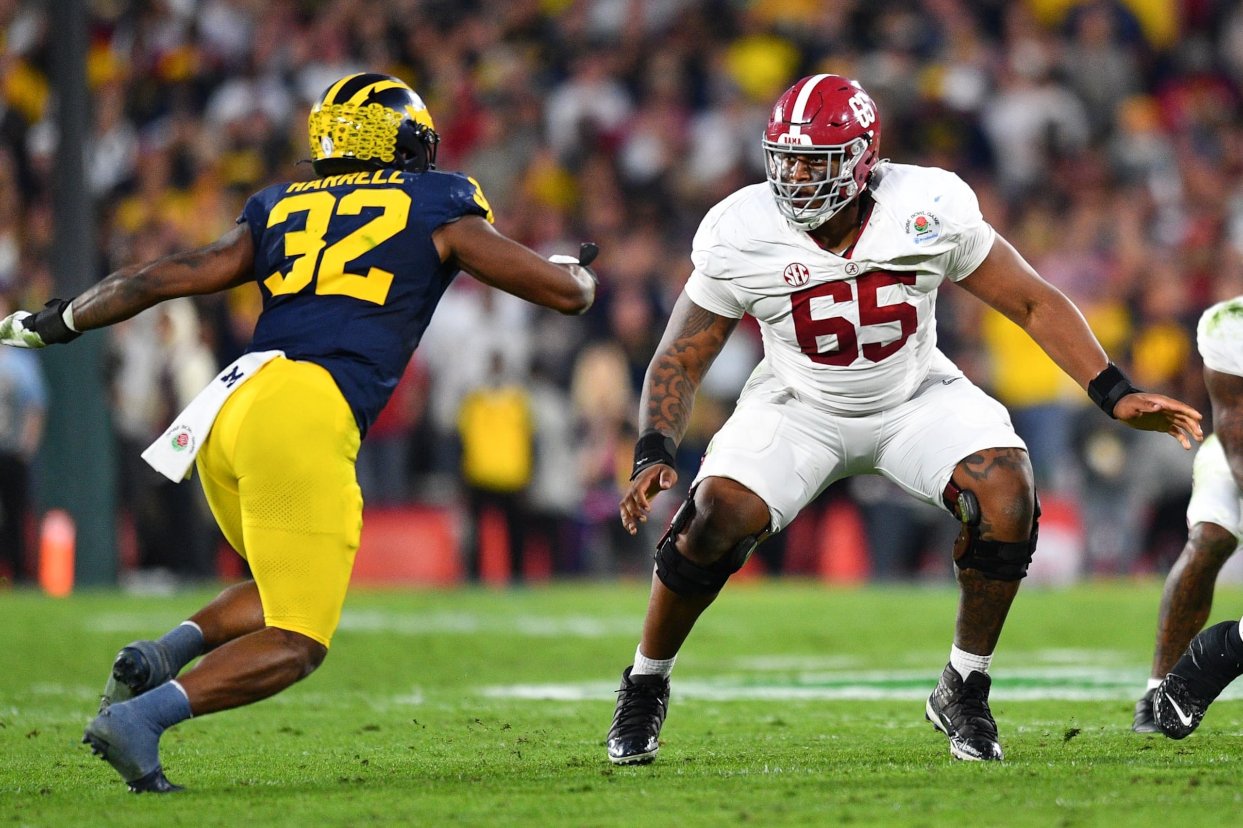 PASADENA, CA - JANUARY 01: OL JC Latham (65) of the Alabama Crimson Tide blocks during the Alabama Crimson Tide game versus the Michigan Wolverines CFP Semifinal at the Rose Bowl Game on January, 1, 2024, at the Rose Bowl Stadium in Pasadena, CA. (Photo by Brian Rothmuller/Icon Sportswire via Getty Images)