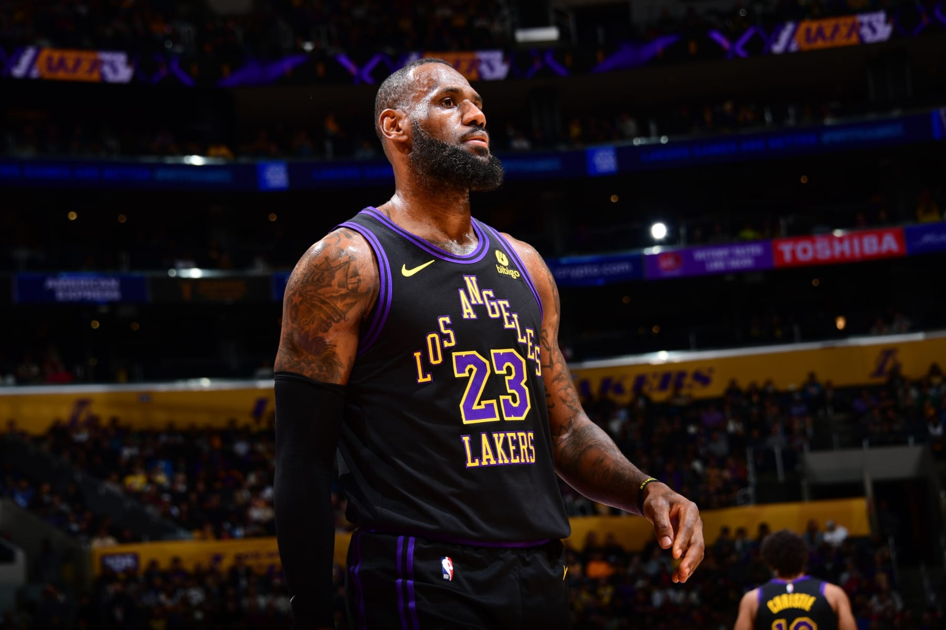 LOS ANGELES, CA - JANUARY 9: LeBron James #23 of the Los Angeles Lakers looks on during the game against the Toronto Raptors on January 9, 2024 at Crypto.Com Arena in Los Angeles, California. NOTE TO USER: User expressly acknowledges and agrees that, by downloading and/or using this Photograph, user is consenting to the terms and conditions of the Getty Images License Agreement. Mandatory Copyright Notice: Copyright 2024 NBAE (Photo by Adam Pantozzi/NBAE via Getty Images) LOS ANGELES, CA - JANUARY 9: LeBron James #23 of the Los Angeles Lakers looks on during the game against the Toronto Raptors on January 9, 2024 at Crypto.Com Arena in Los Angeles, California. NOTE TO USER: User expressly acknowledges and agrees that, by downloading and/or using this Photograph, user is consenting to the terms and conditions of the Getty Images License Agreement. Mandatory Copyright Notice: Copyright 2024 NBAE (Photo by Adam Pantozzi/NBAE via Getty Images)